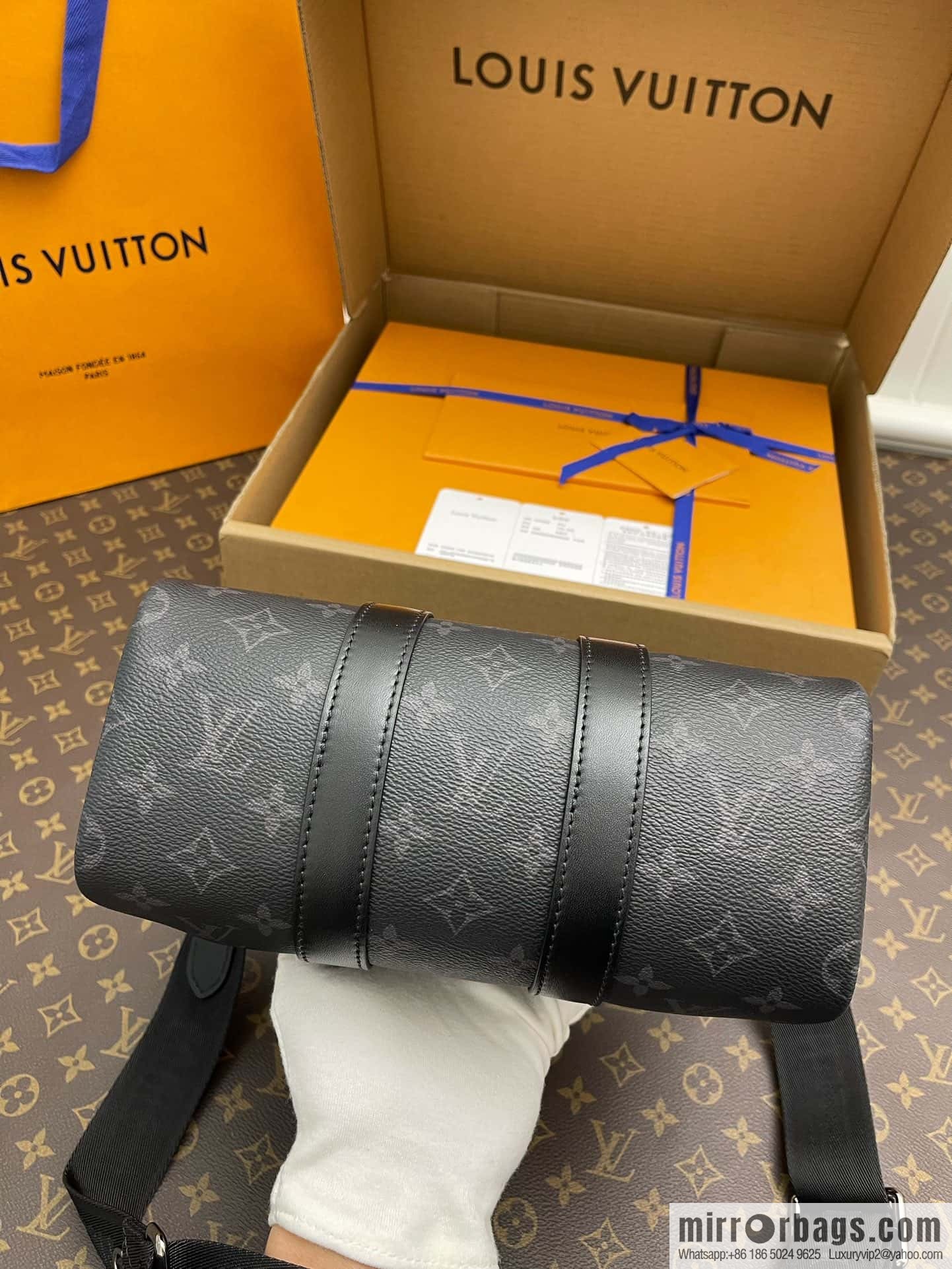 Louis Vuitton M46271 KEEPALL BANDOULI RE 25 handbag