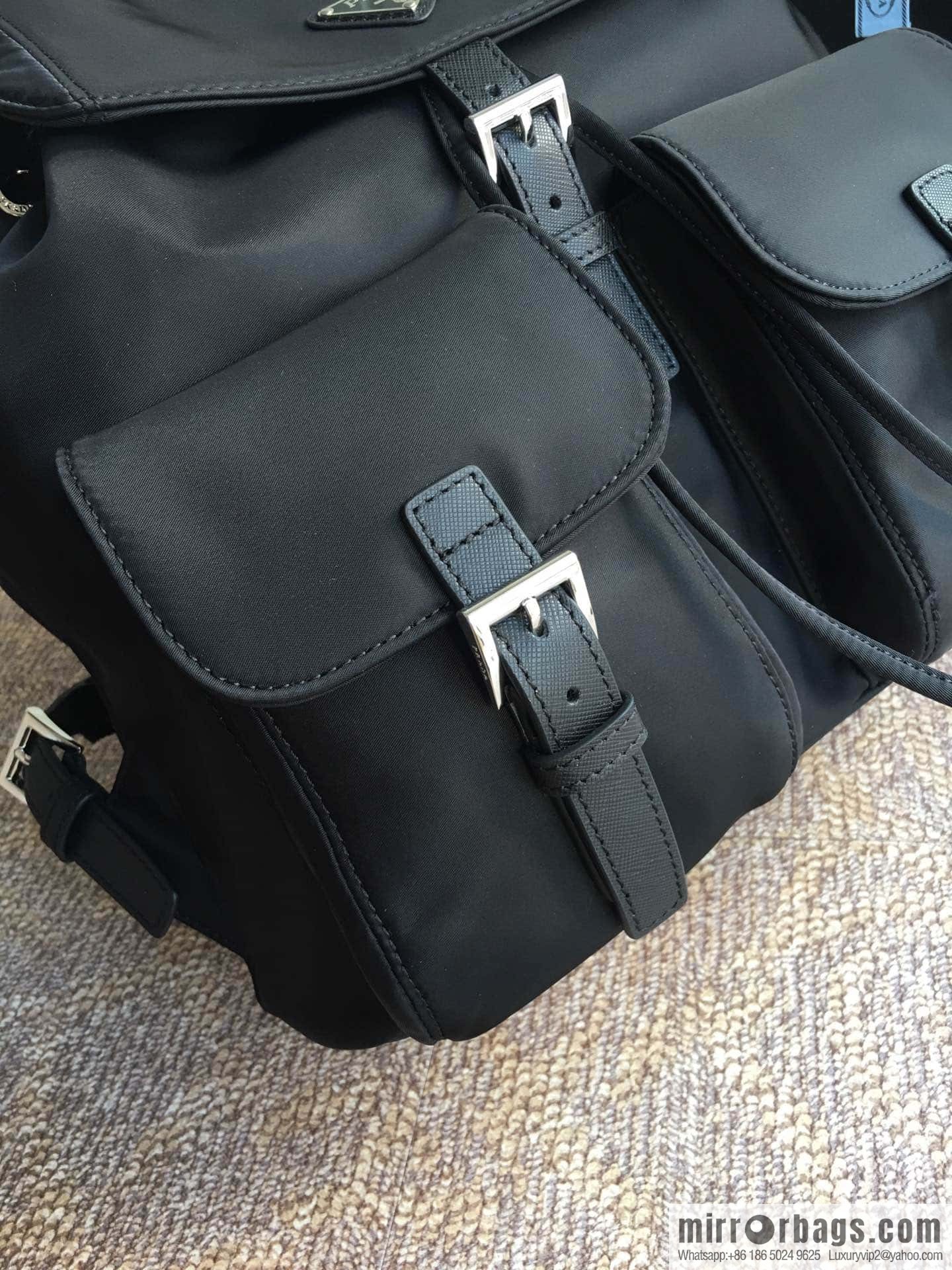 PRADA imported parachute fabric + cross pattern leather backpack 2811