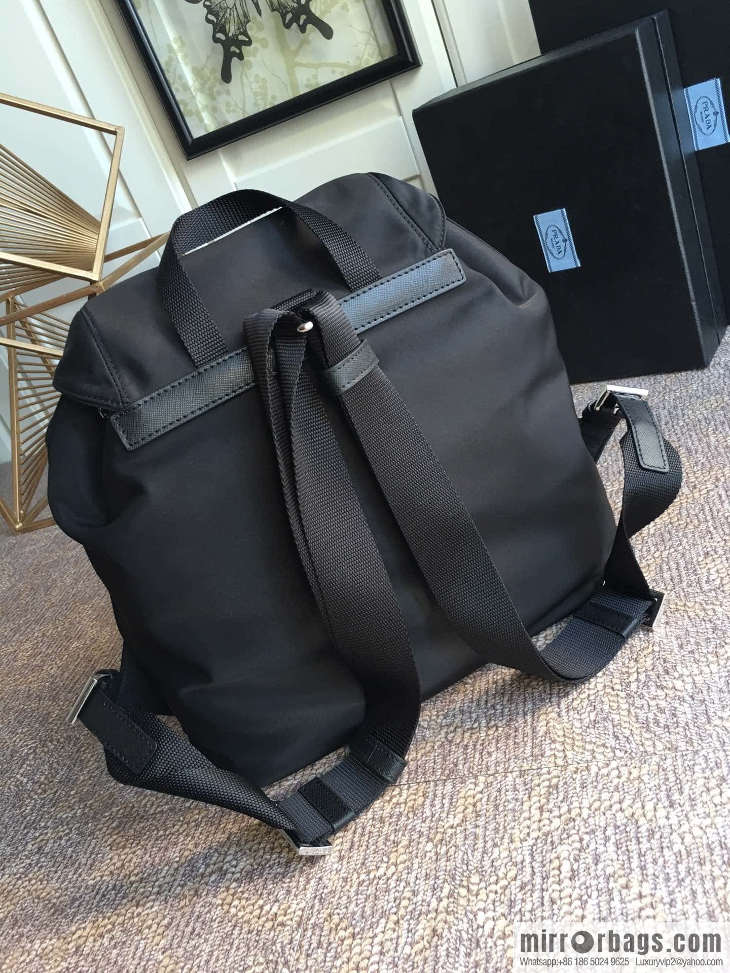PRADA imported parachute fabric + cross pattern leather backpack 2811