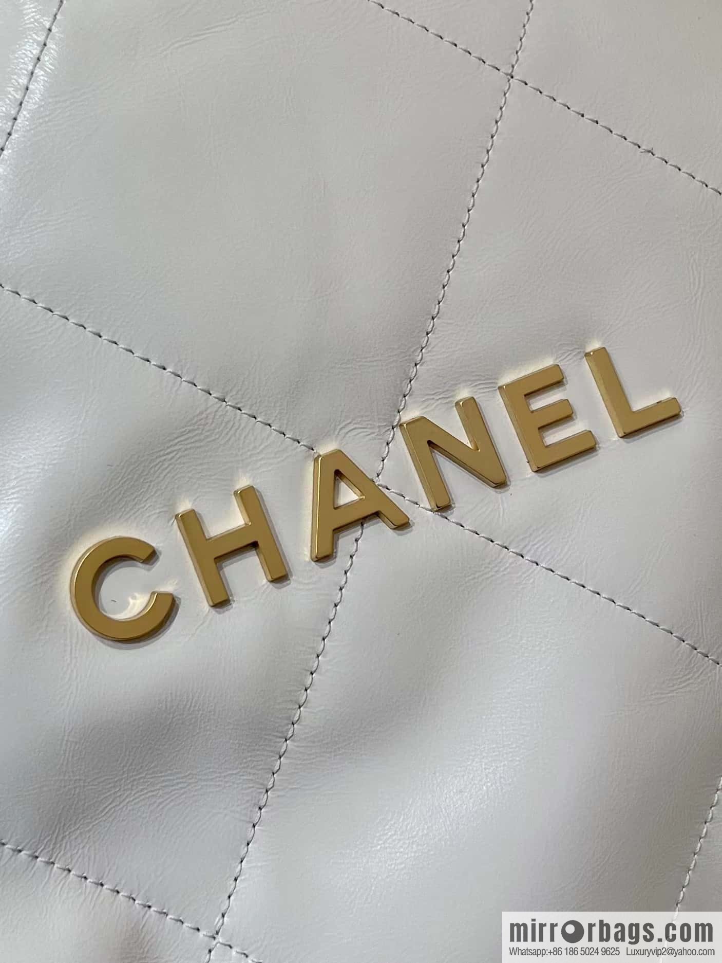 CHANEL 24C early spring vacation series 22 horizontal garbage bag AS4486 white/gold metal