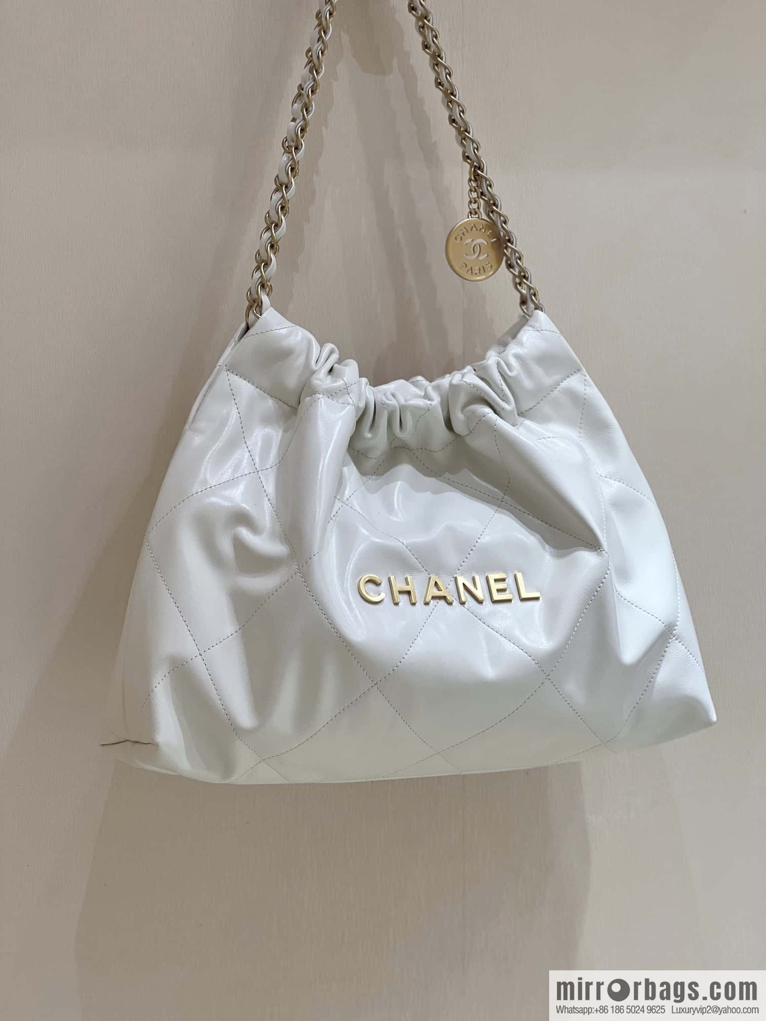 CHANEL 24C early spring vacation series 22 horizontal garbage bag AS4486 white/gold metal