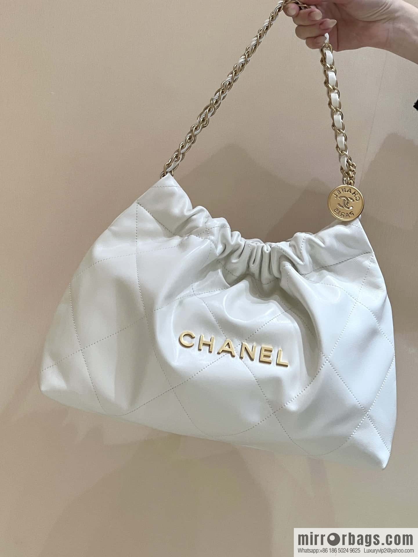 CHANEL 24C early spring vacation series 22 horizontal garbage bag AS4486 white/gold metal