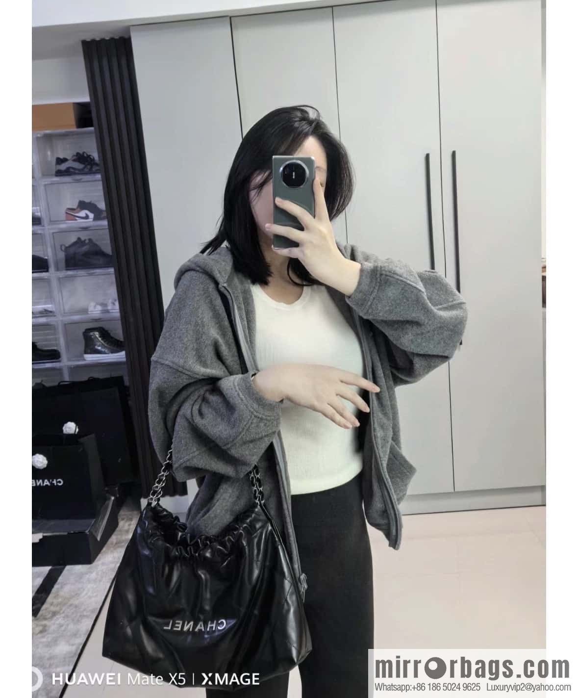 CHANEL 24C horizontal 22 handbag AS4486 black silver buckle