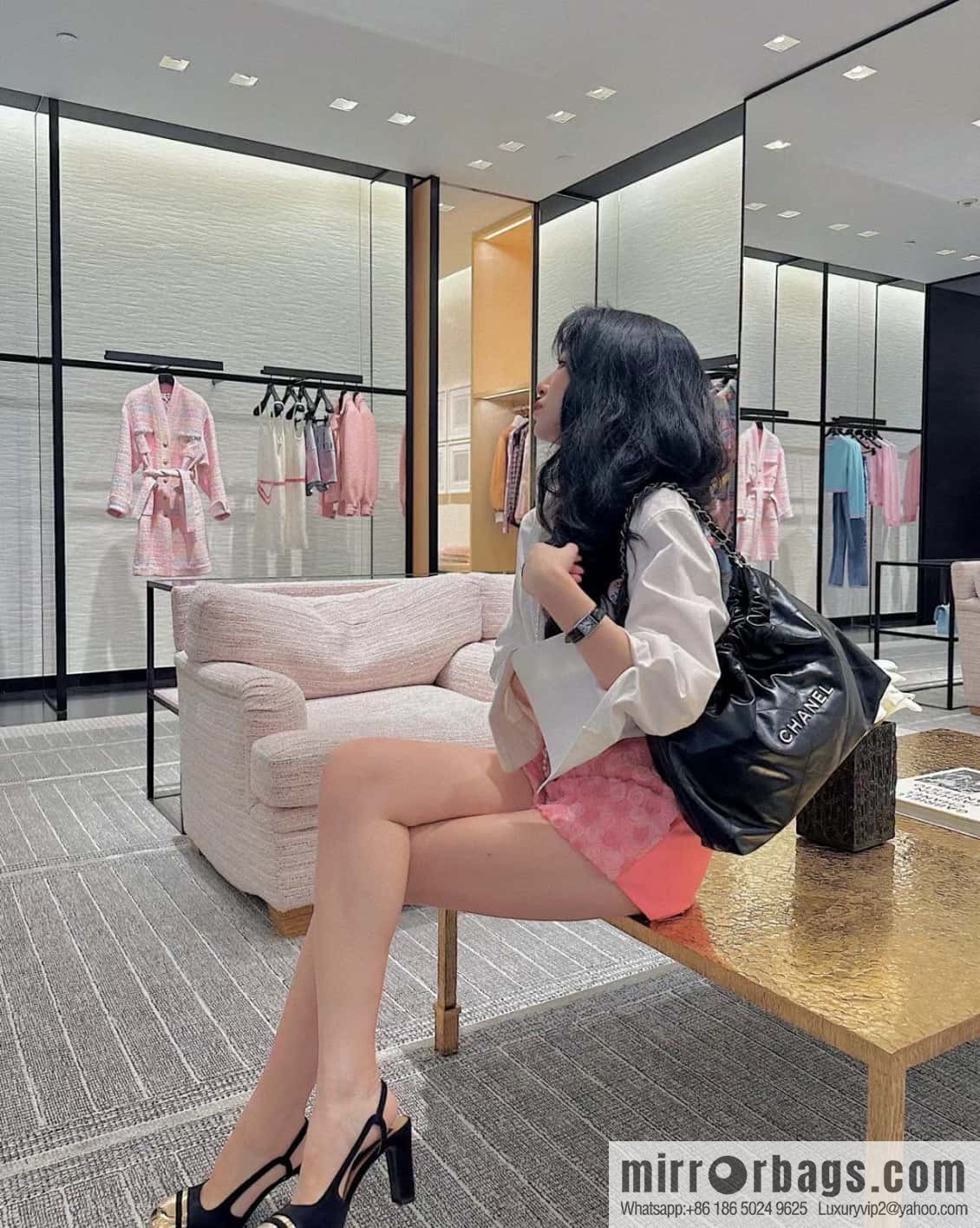 CHANEL 24C horizontal 22 handbag AS4486 black silver buckle