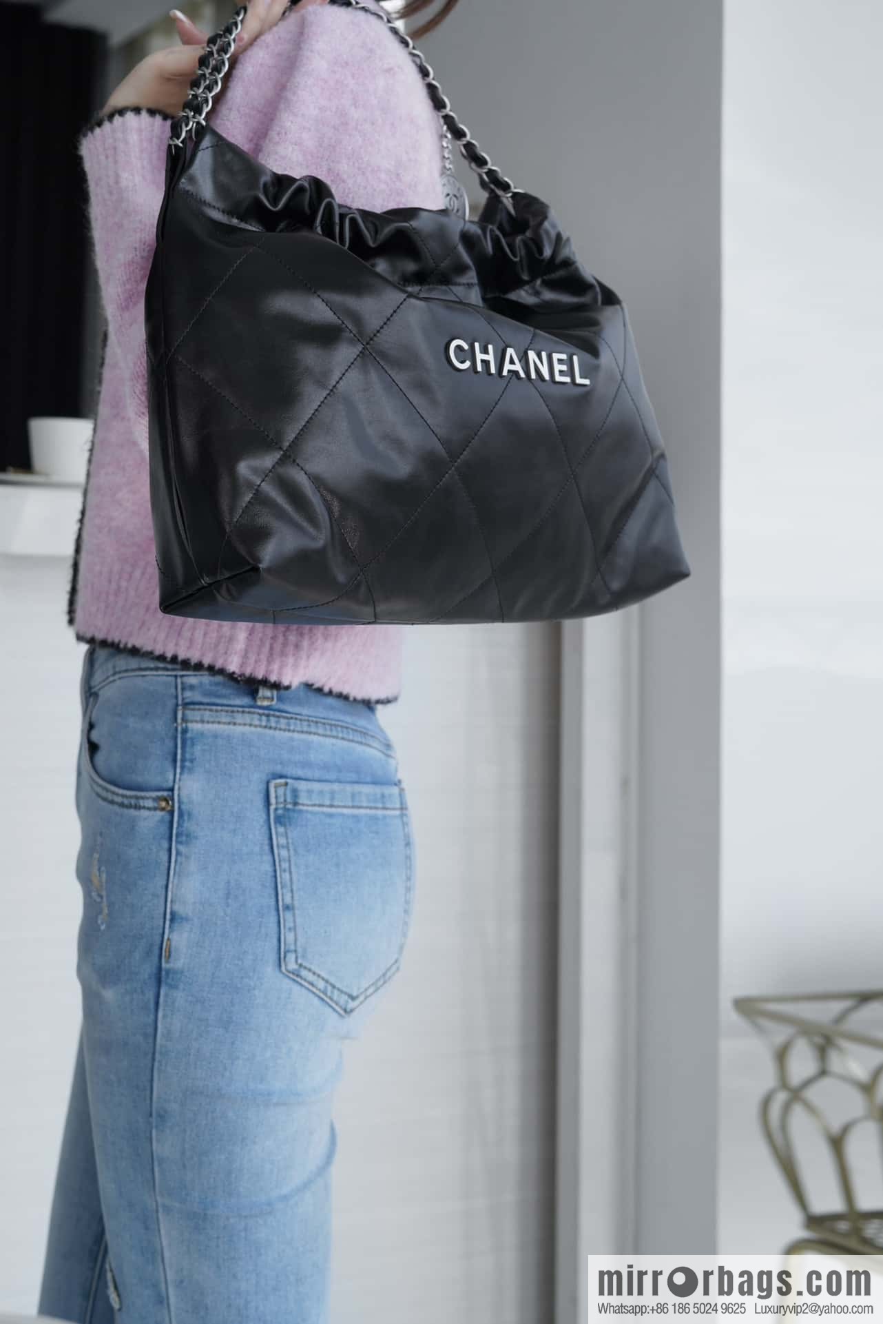 CHANEL 24C horizontal 22 handbag AS4486 black silver buckle