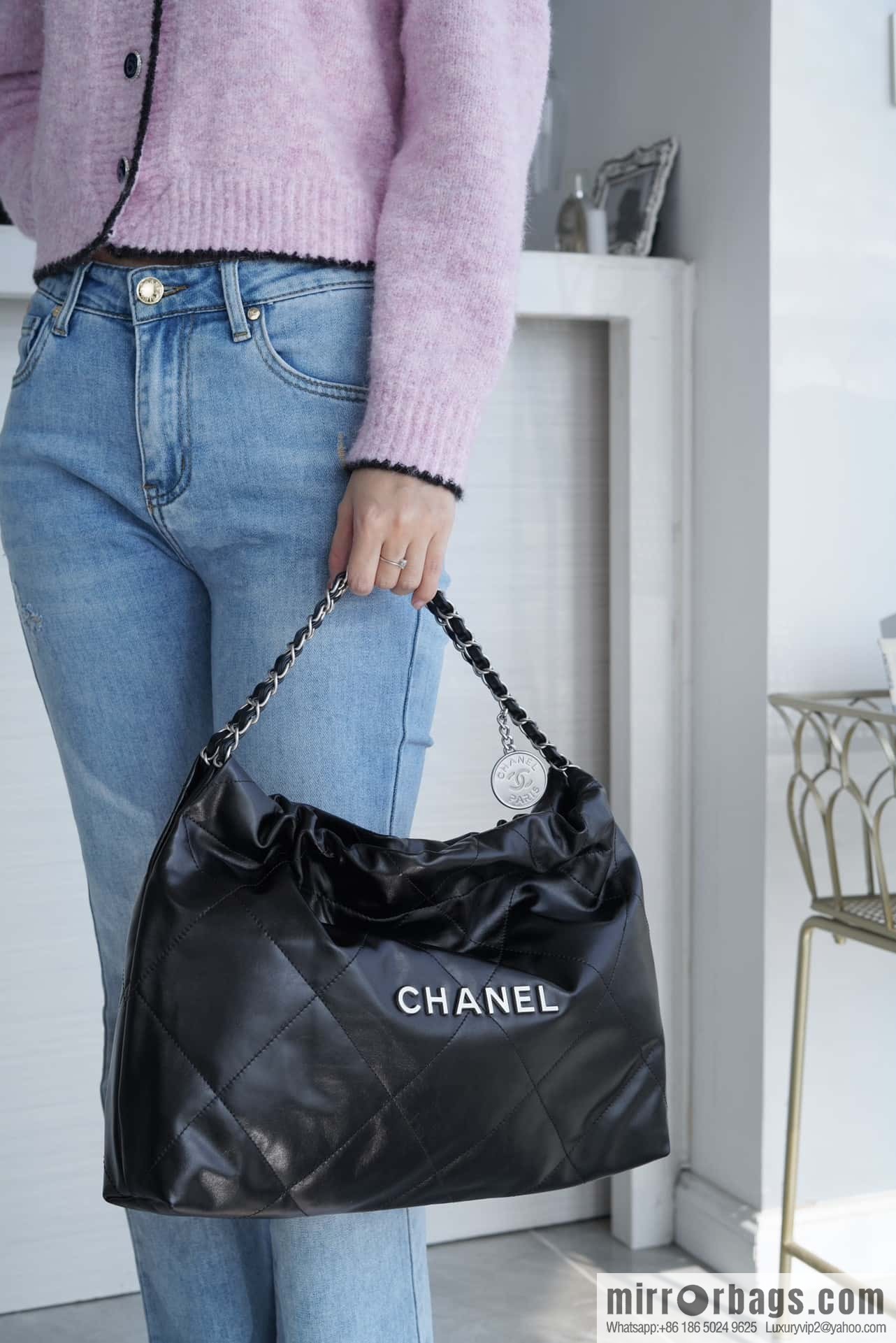 CHANEL 24C horizontal 22 handbag AS4486 black silver buckle