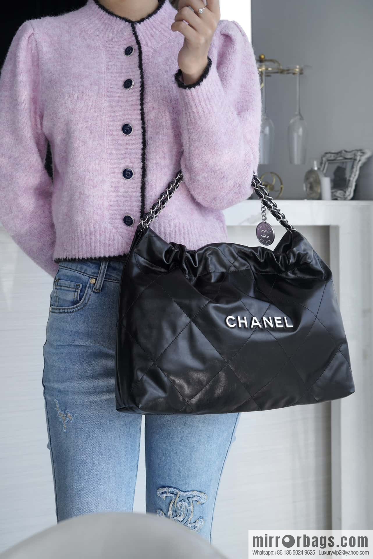 CHANEL 24C horizontal 22 handbag AS4486 black silver buckle