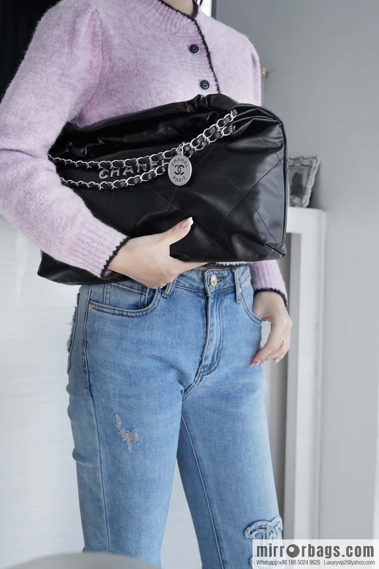 CHANEL 24C horizontal 22 handbag AS4486 black silver buckle