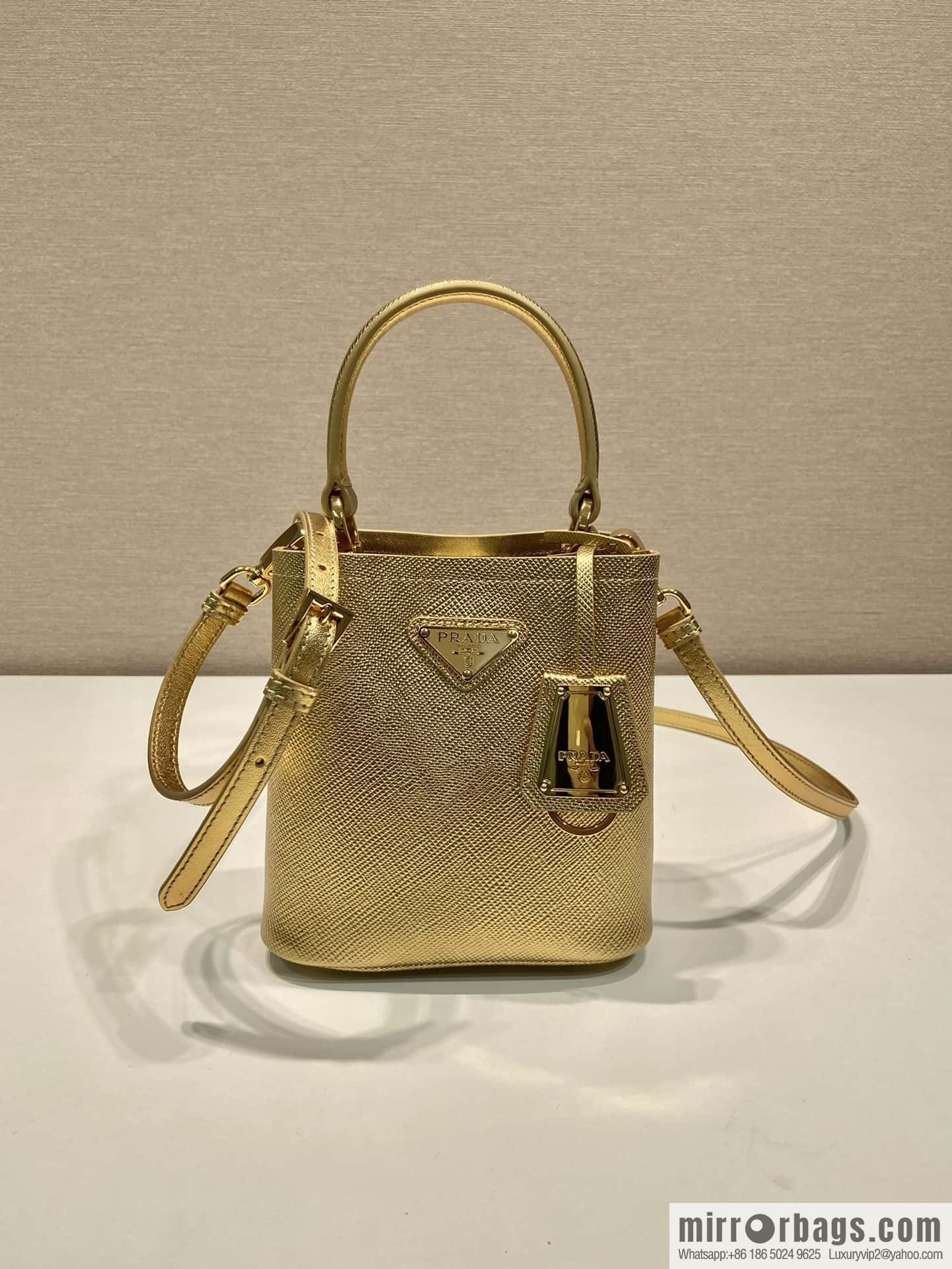 PRADA new color bucket bag 🎉 1BA373 gold