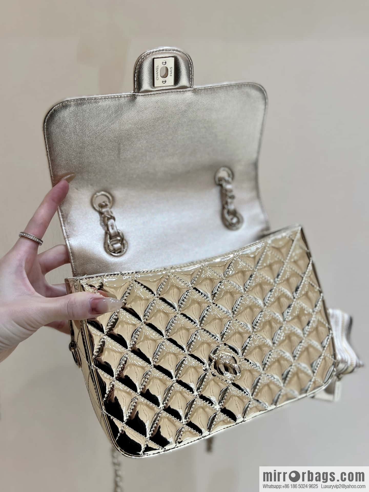 CHANEL 24C early spring vacation series catwalk model patent leather double backpack AS4649 gold