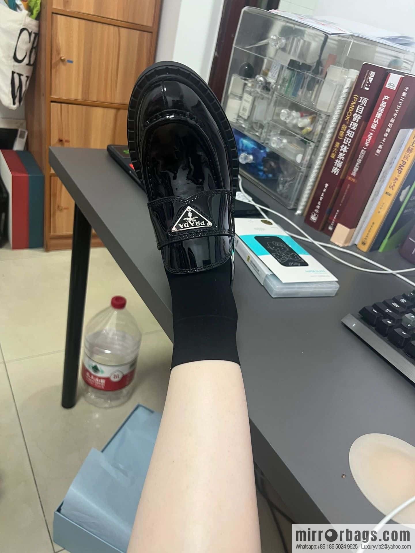 Prada, Puhada glossy patent leather triangle loafers