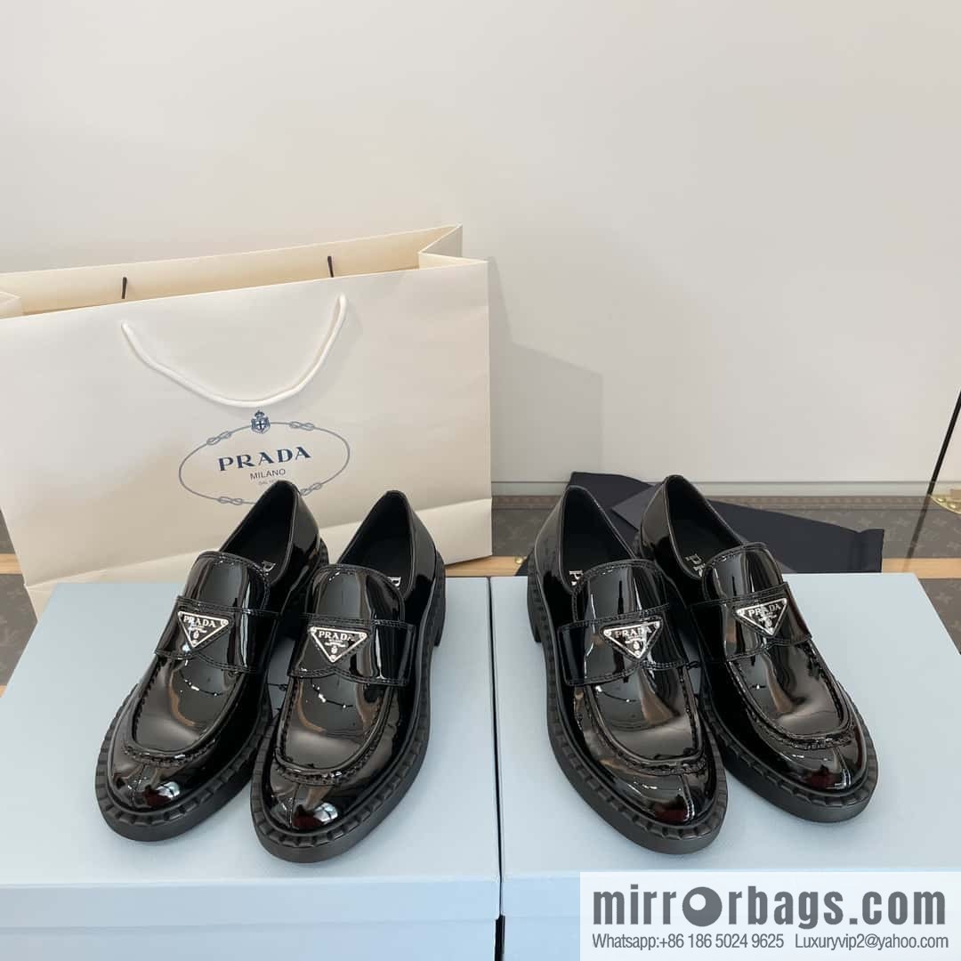 Prada, Puhada glossy patent leather triangle loafers