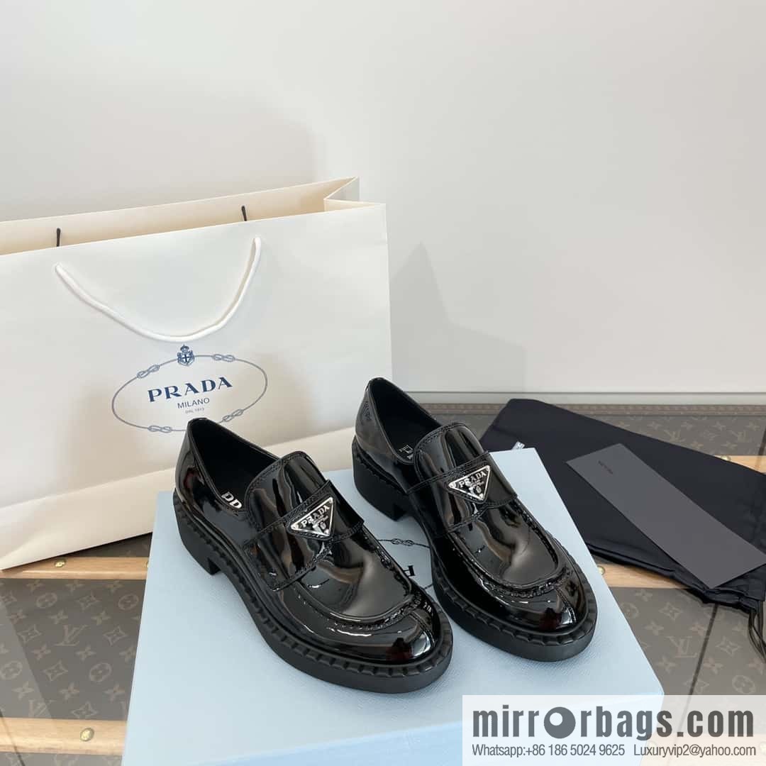 Prada, Puhada glossy patent leather triangle loafers