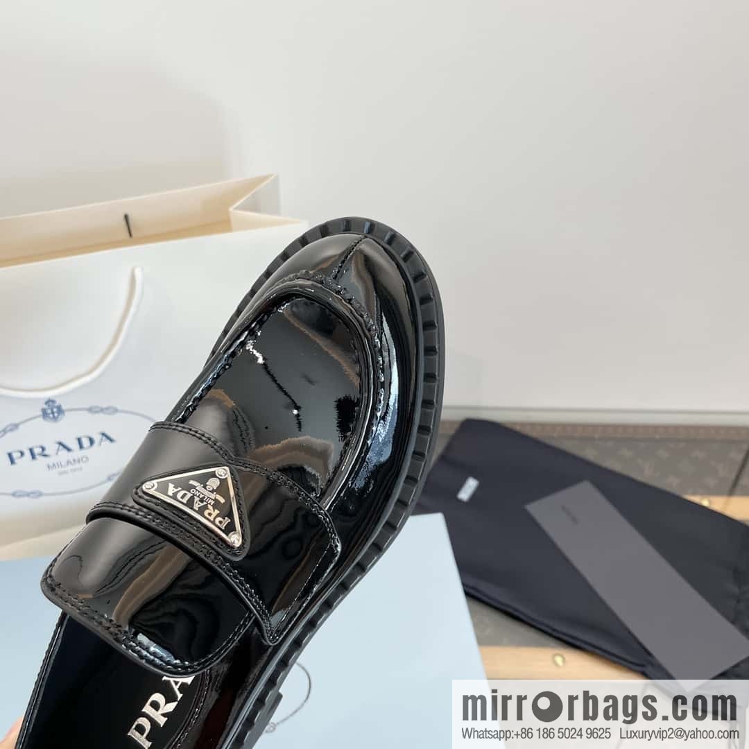 Prada, Puhada glossy patent leather triangle loafers