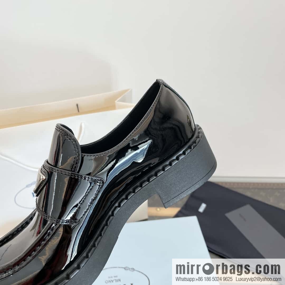Prada, Puhada glossy patent leather triangle loafers