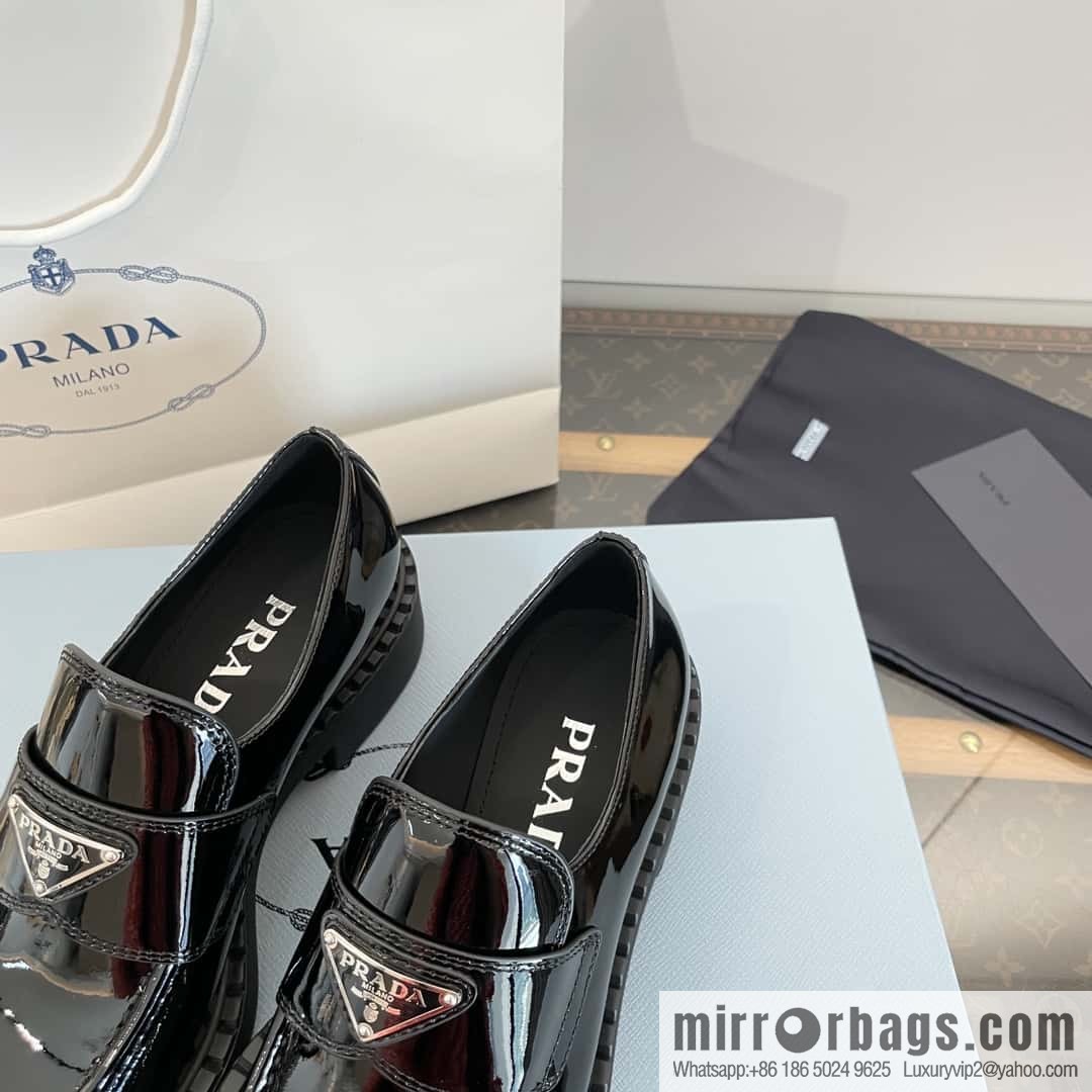 Prada, Puhada glossy patent leather triangle loafers