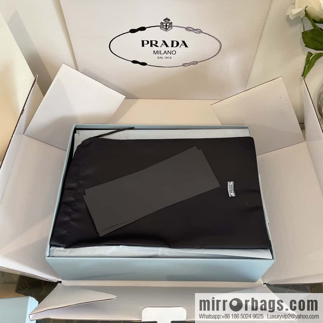 Prada, Puhada glossy patent leather triangle loafers