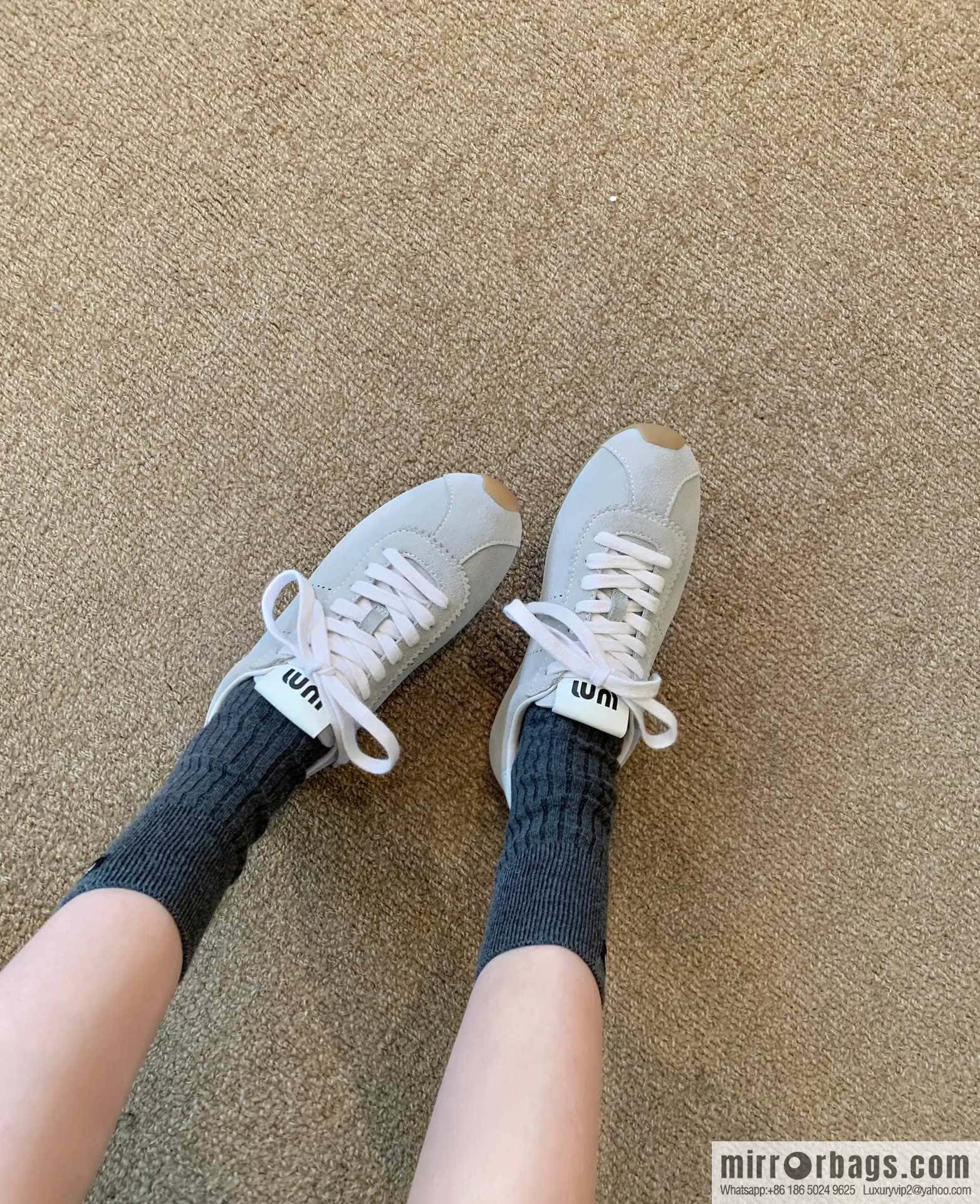 MIUMIU Miu Miu Early spring flat-soled lace-up Forrest training shoes