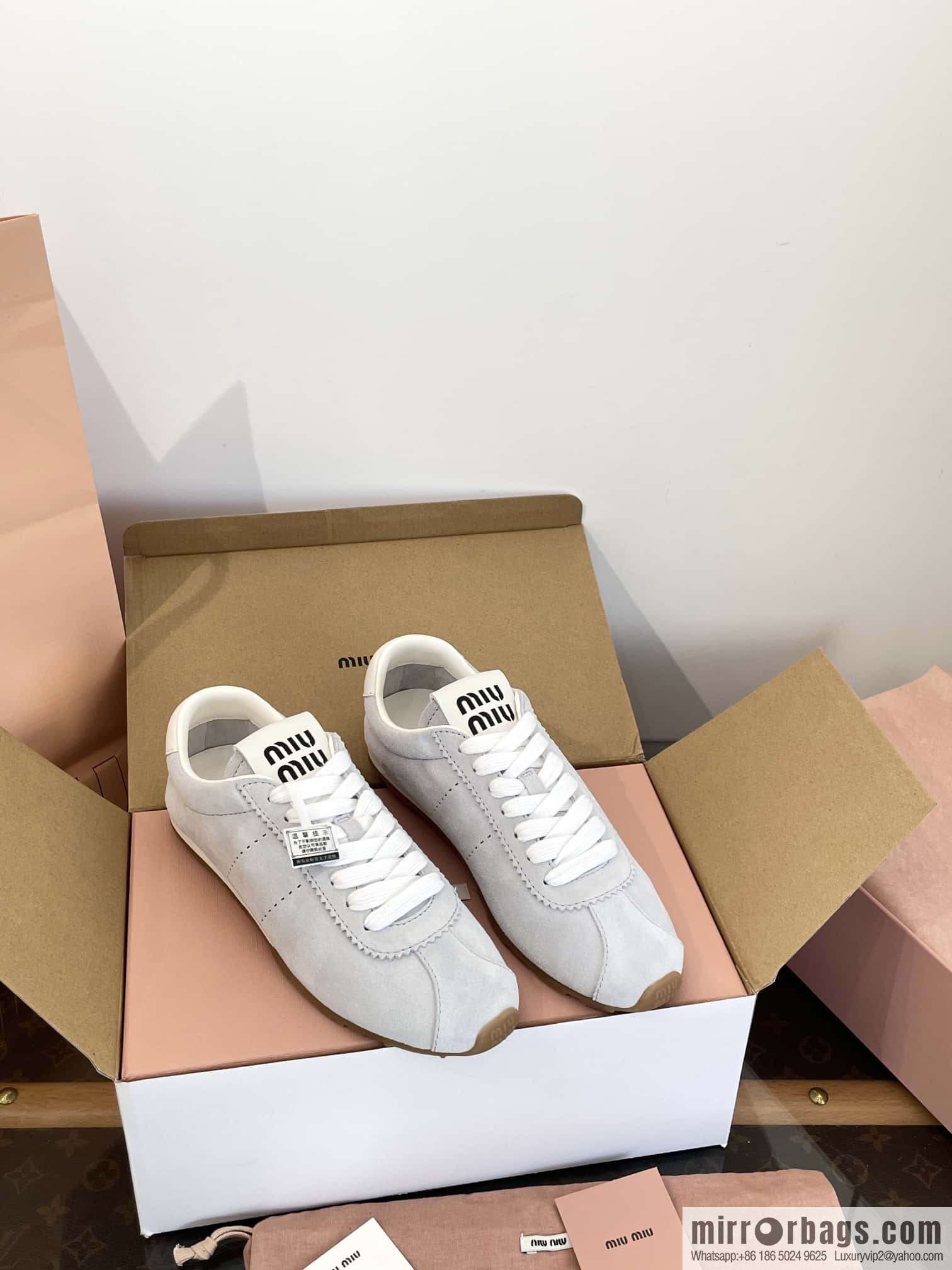 MIUMIU Miu Miu Early spring flat-soled lace-up Forrest training shoes