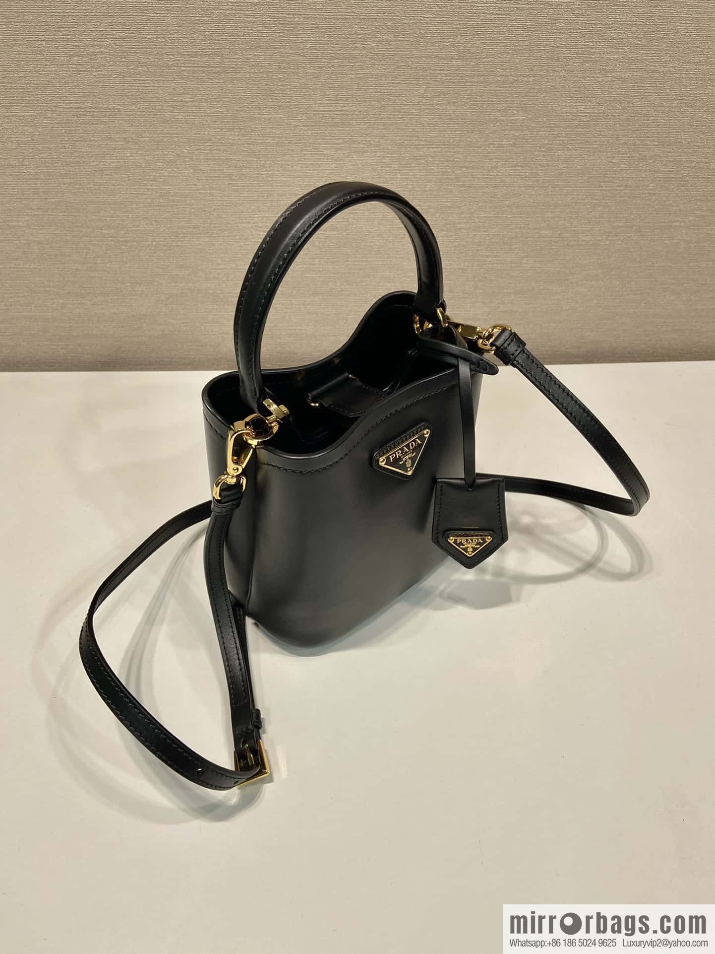 PRTADA Prada calfskin leather (fabric) bucket bag 1BA373