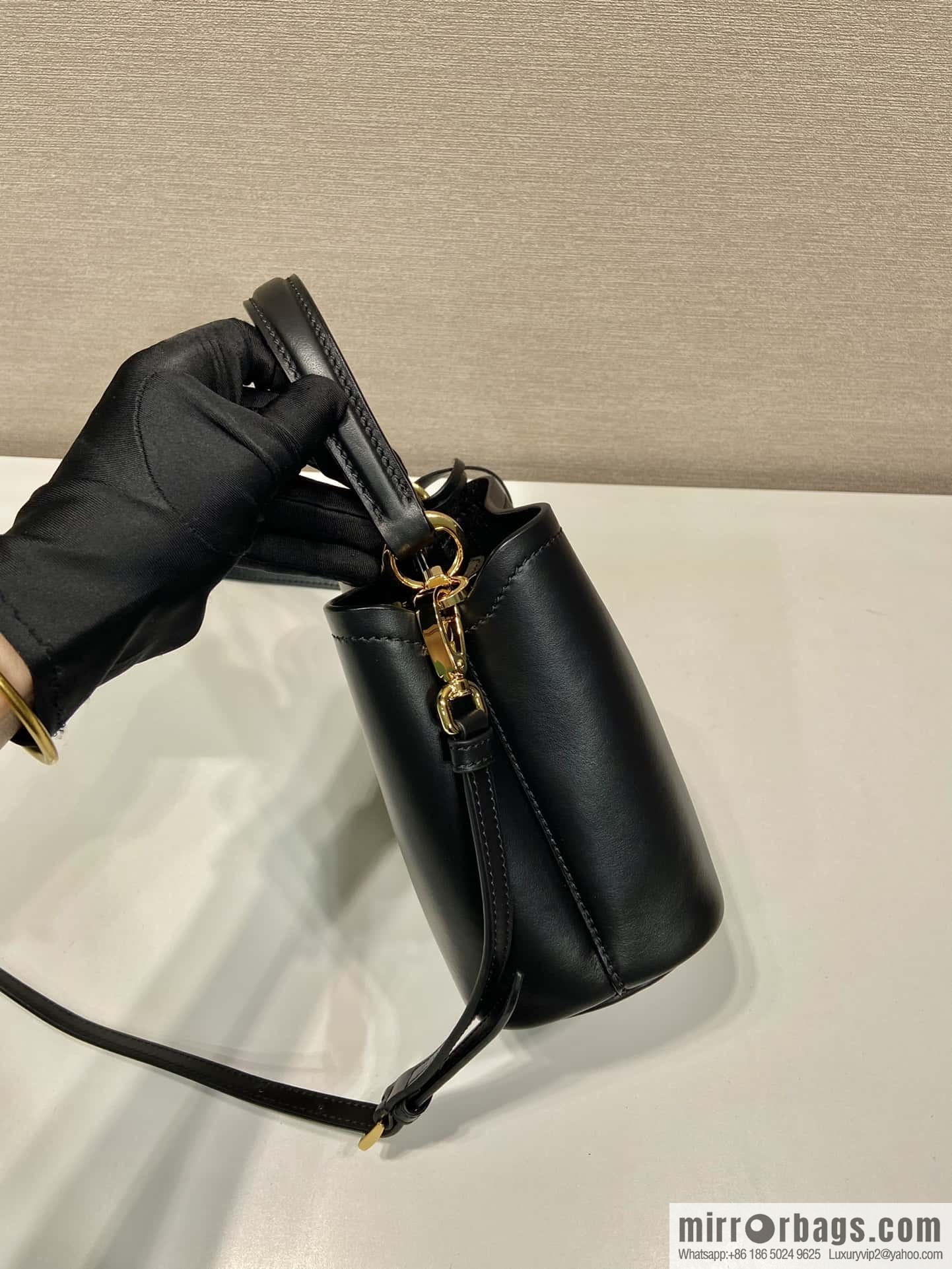 PRTADA Prada calfskin leather (fabric) bucket bag 1BA373