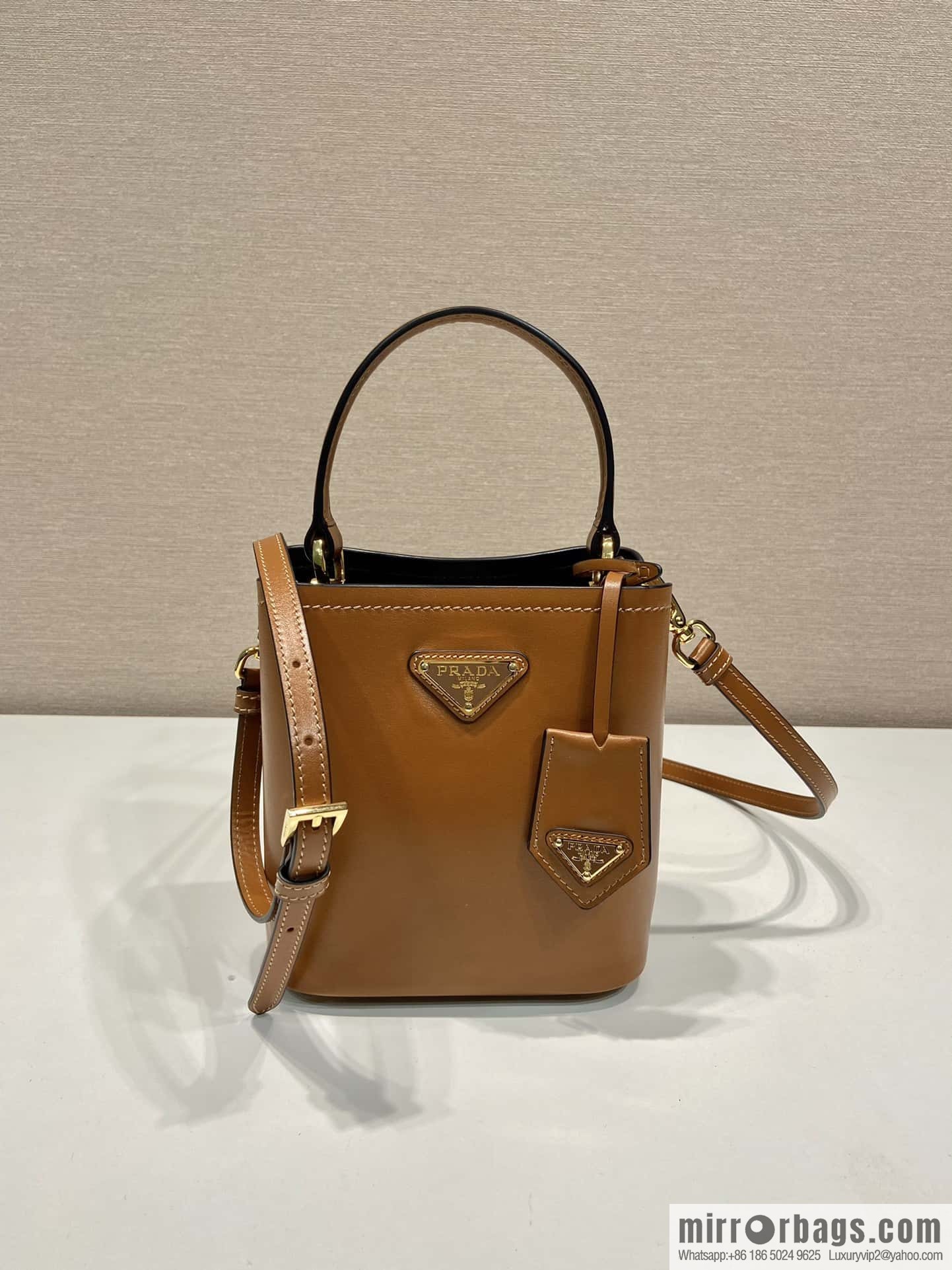 PRTADA Prada calfskin leather (fabric) bucket bag 1BA373