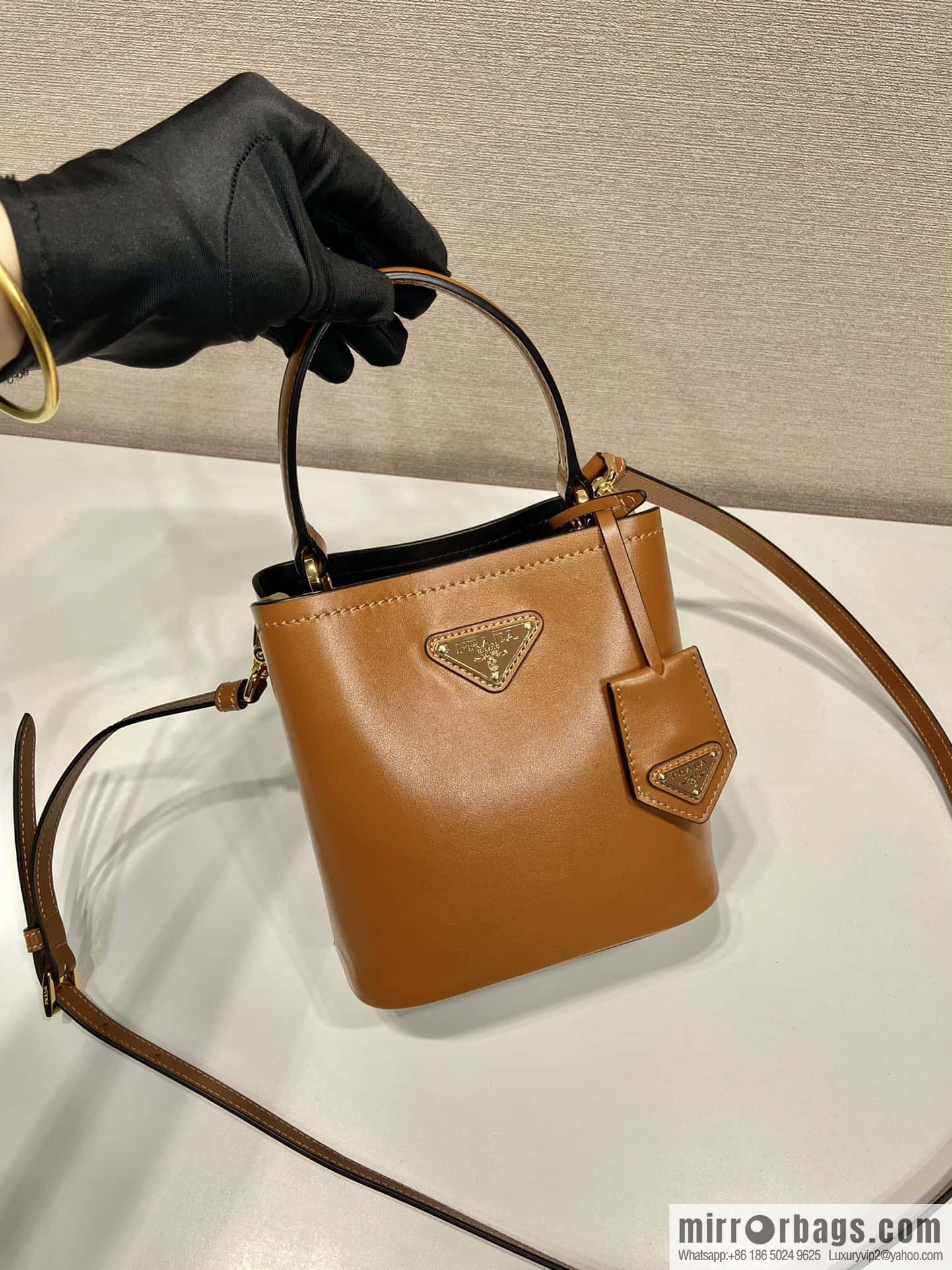 PRTADA Prada calfskin leather (fabric) bucket bag 1BA373