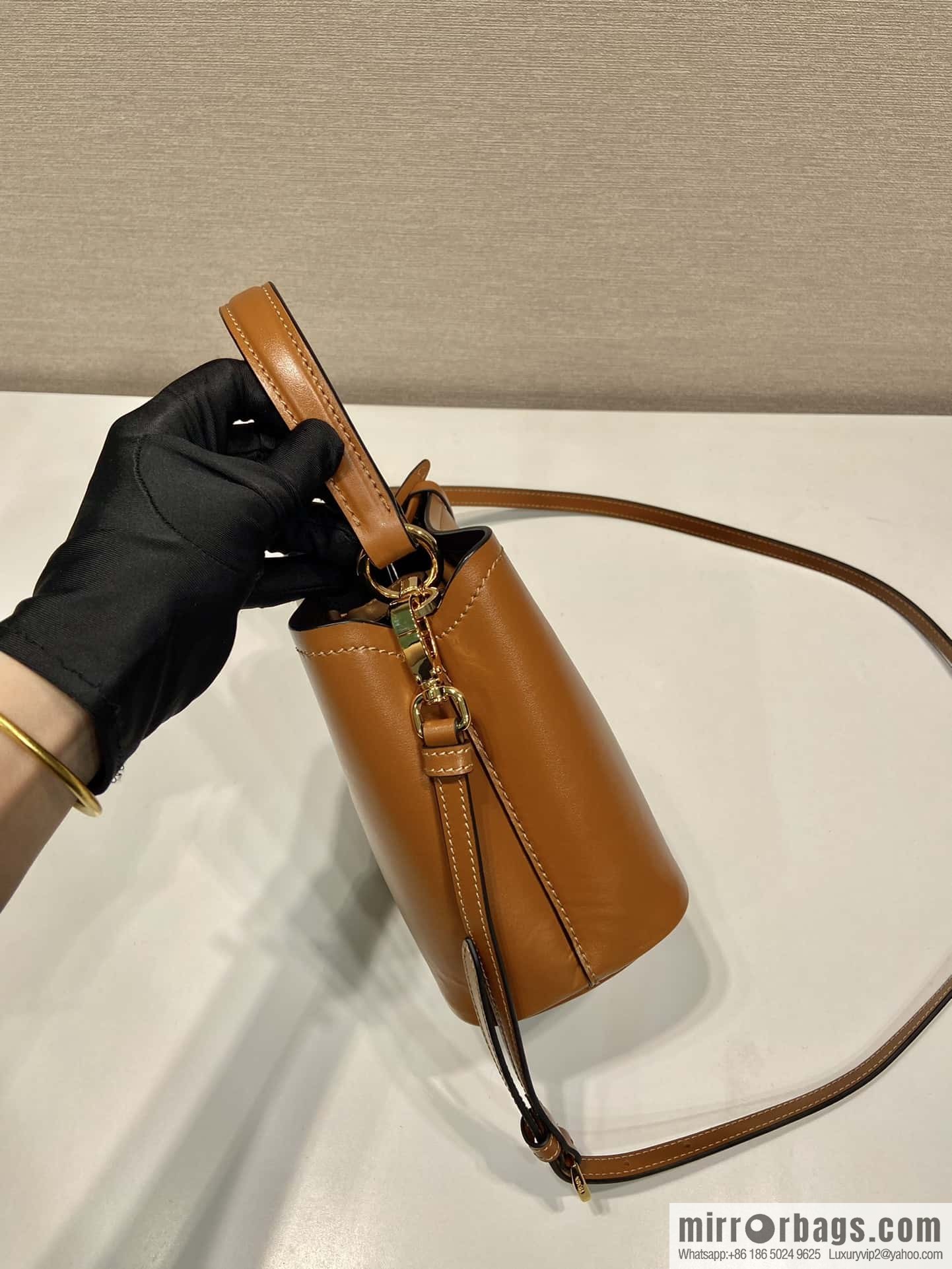 PRTADA Prada calfskin leather (fabric) bucket bag 1BA373