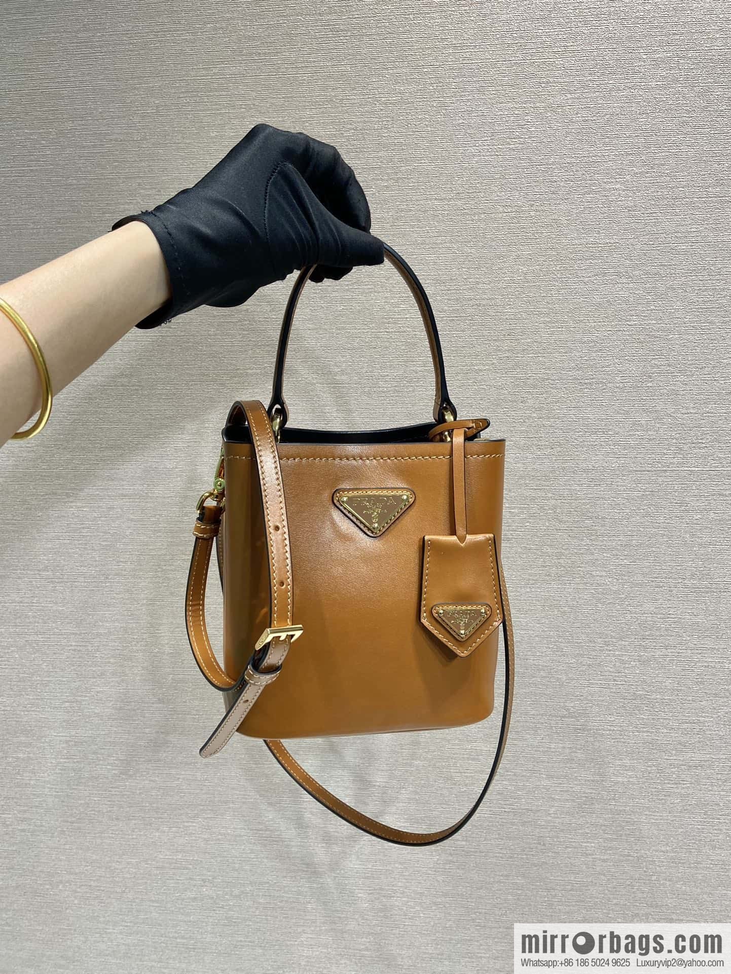 PRTADA Prada calfskin leather (fabric) bucket bag 1BA373