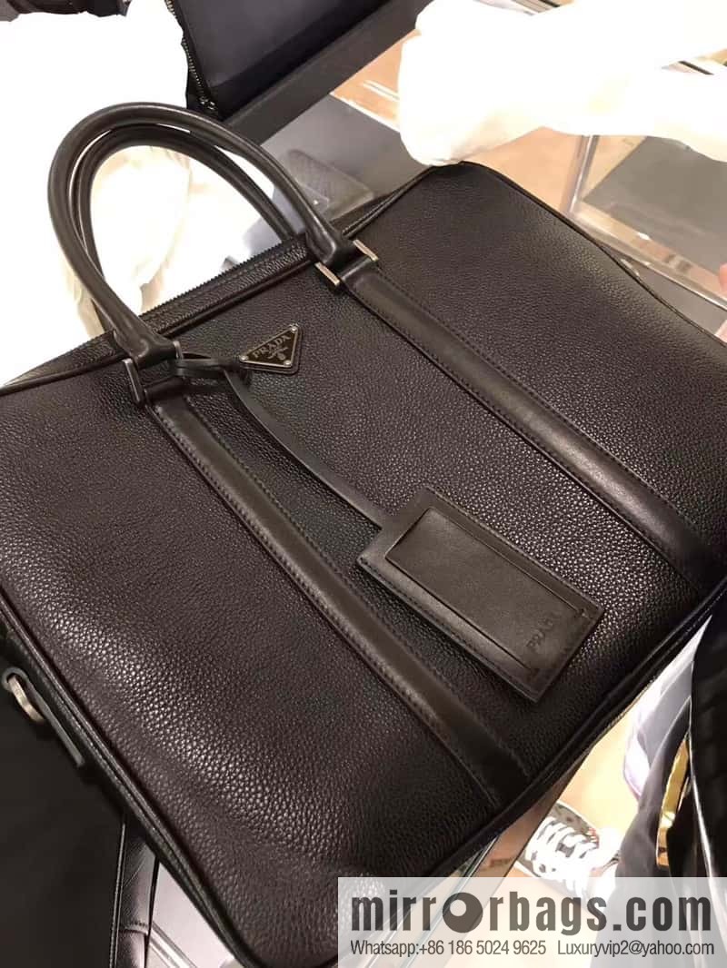 PRADA's latest broken leather briefcase 2VE368