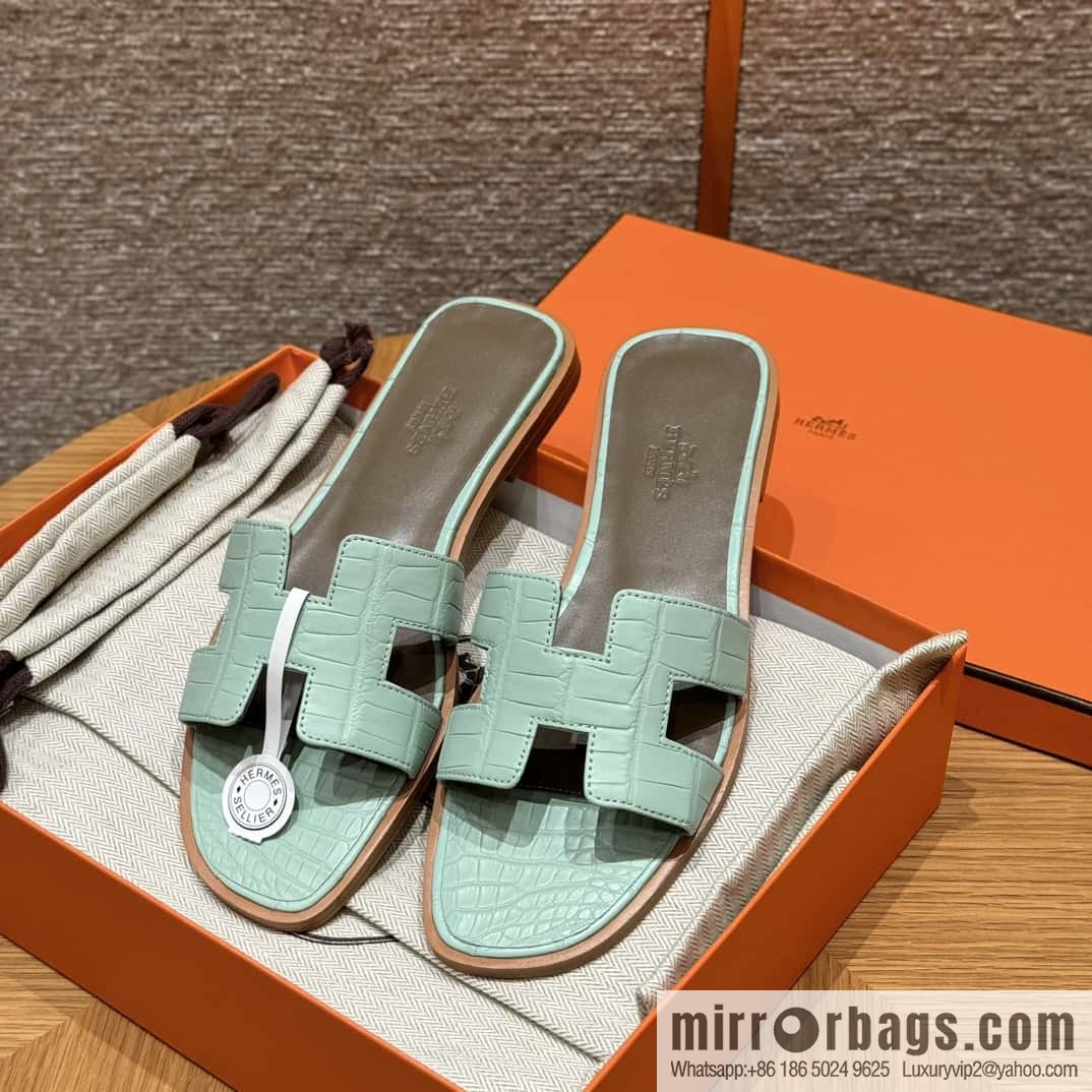 Hermès crocodile slippers