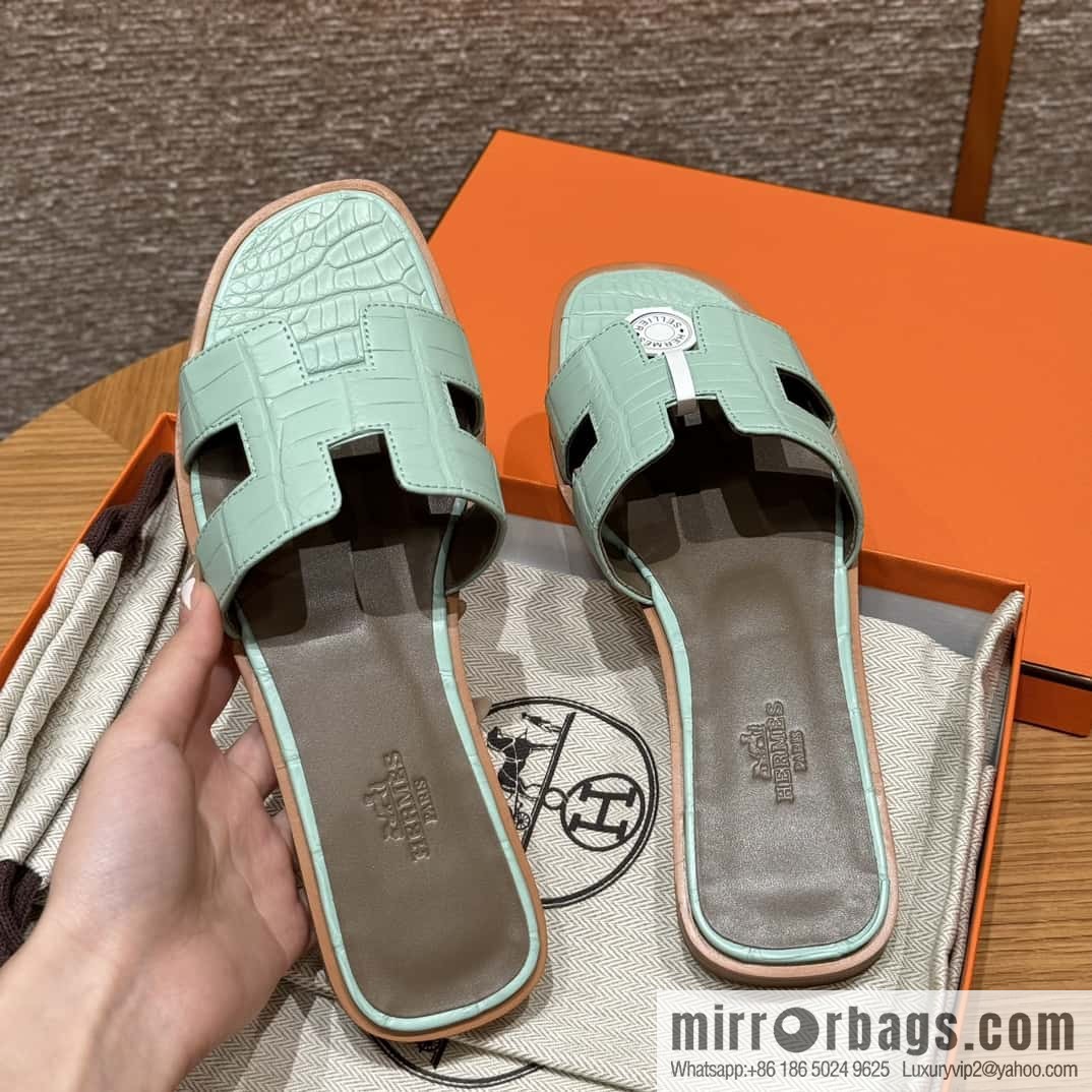 Hermès crocodile slippers