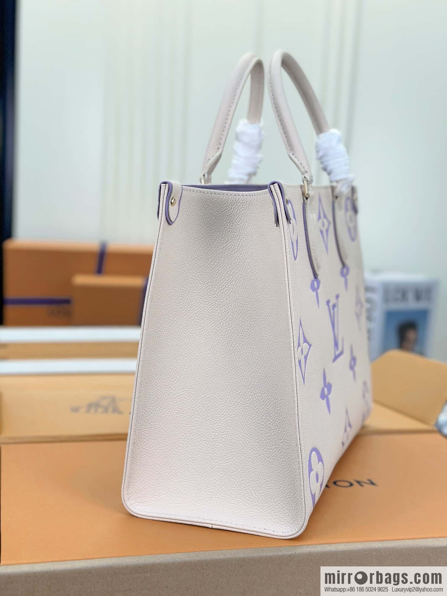 LV M23937 OnTheGo MM