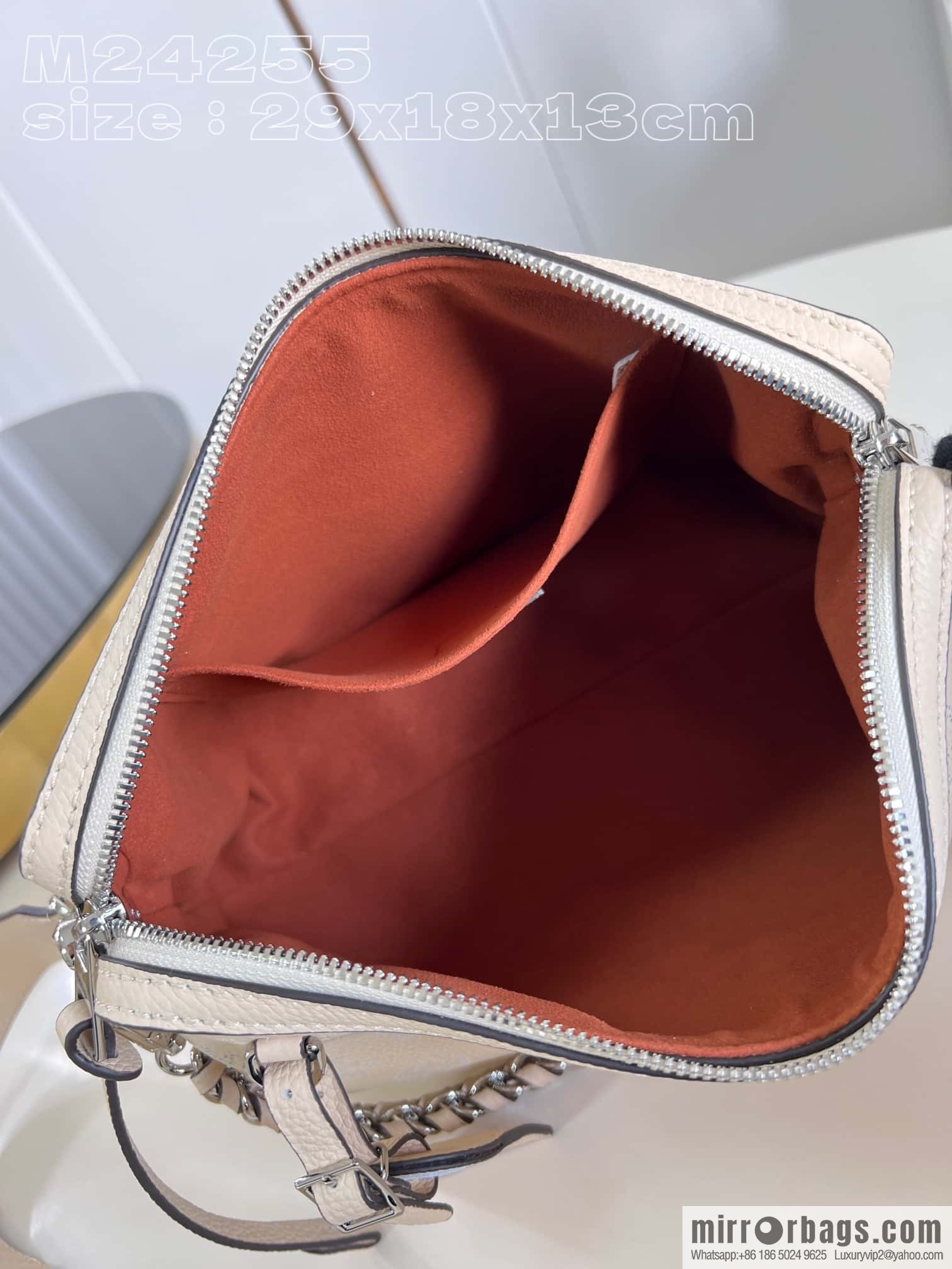 LV M24114 Hand It All PM