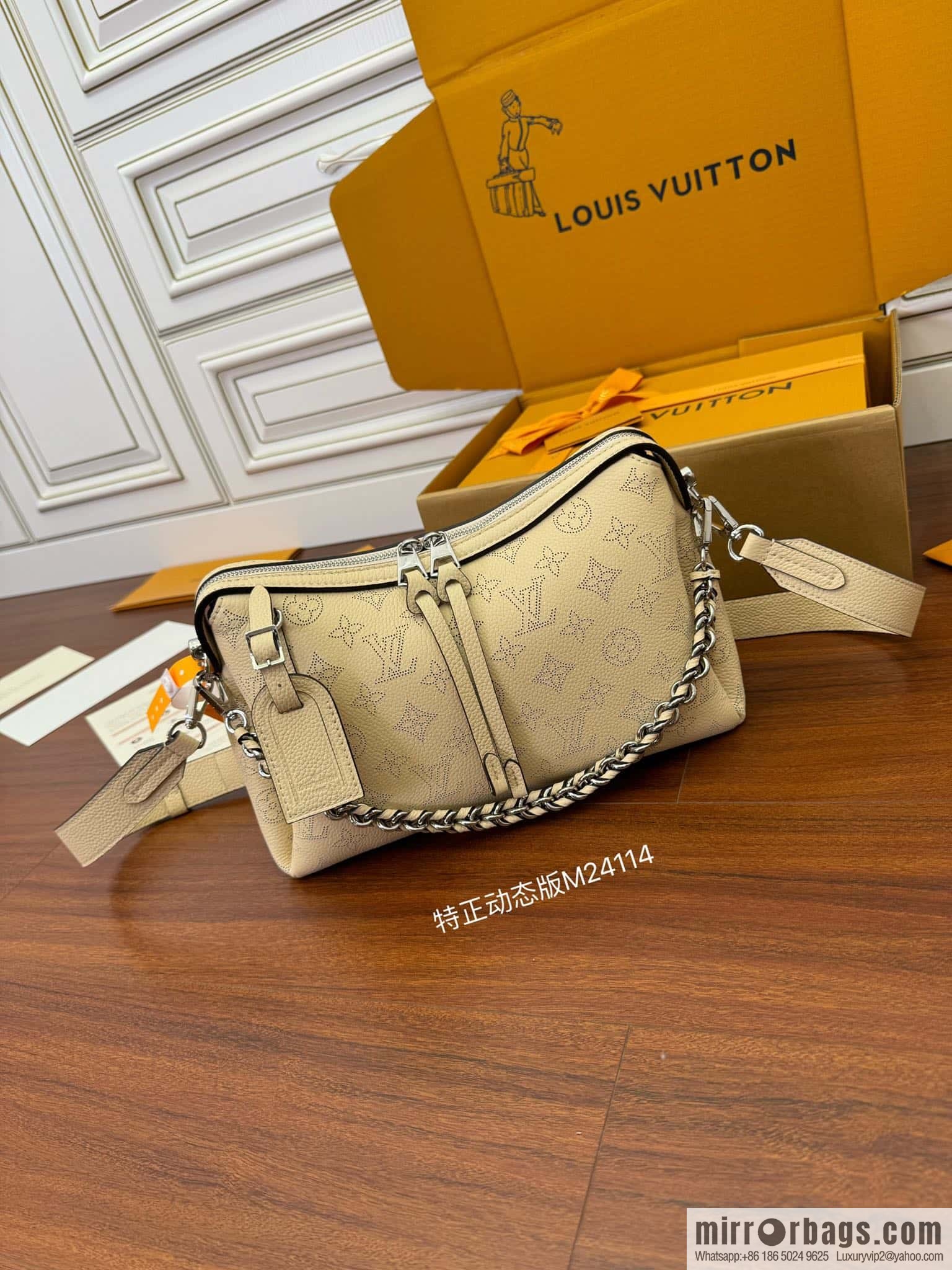 LV M24114 HAND IT ALL Small handbag