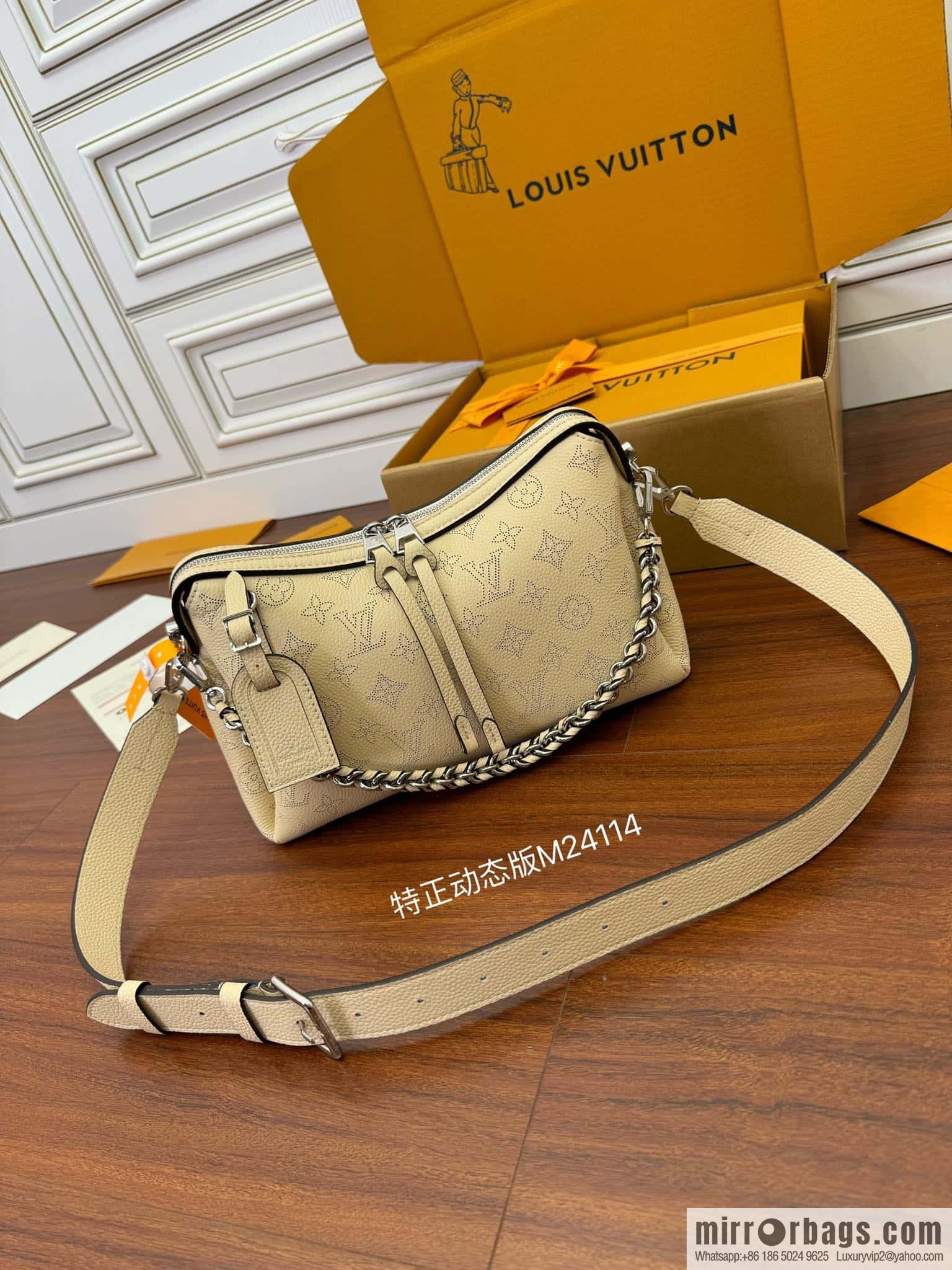 LV M24114 HAND IT ALL Small handbag