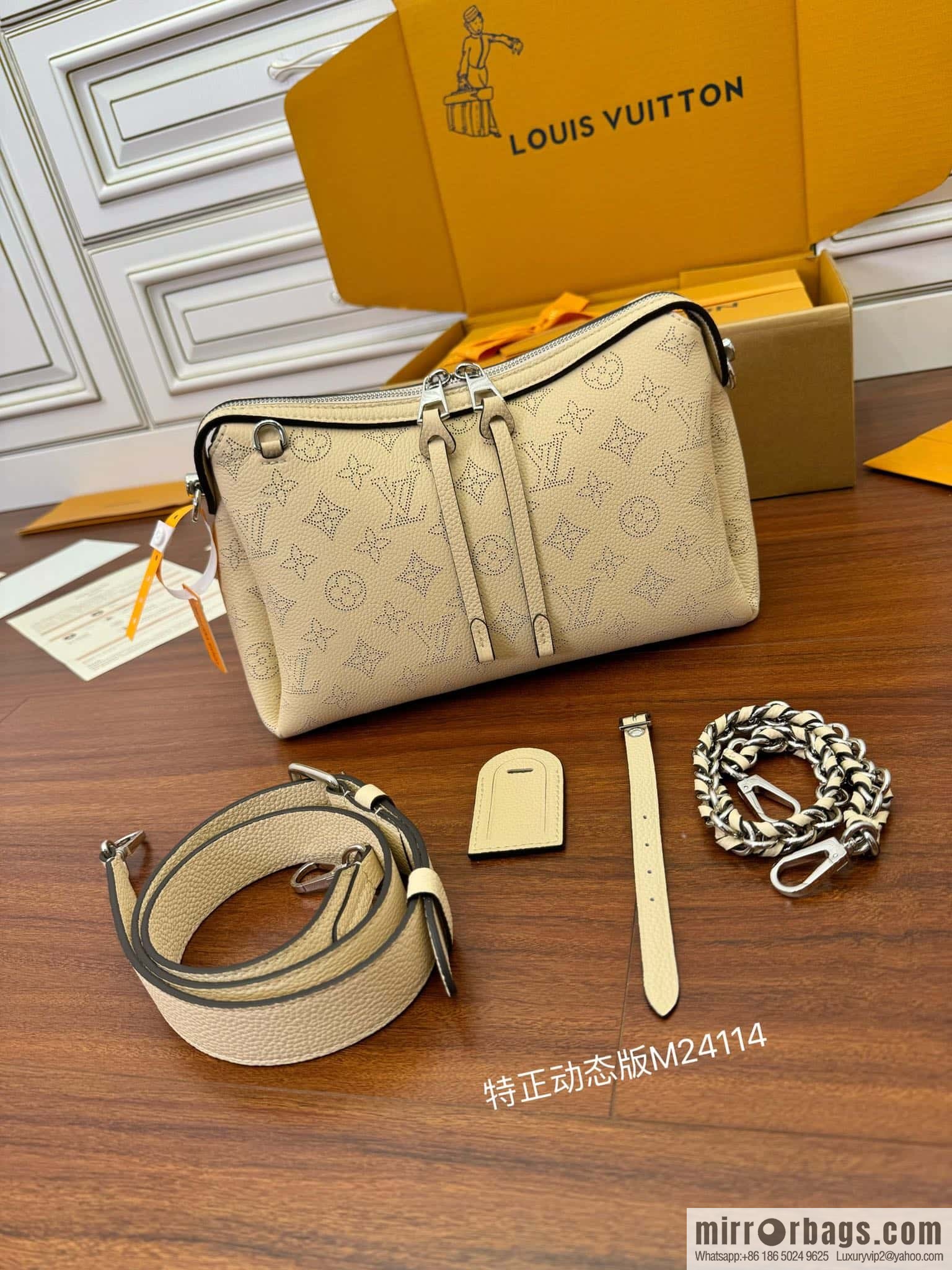 LV M24114 HAND IT ALL Small handbag