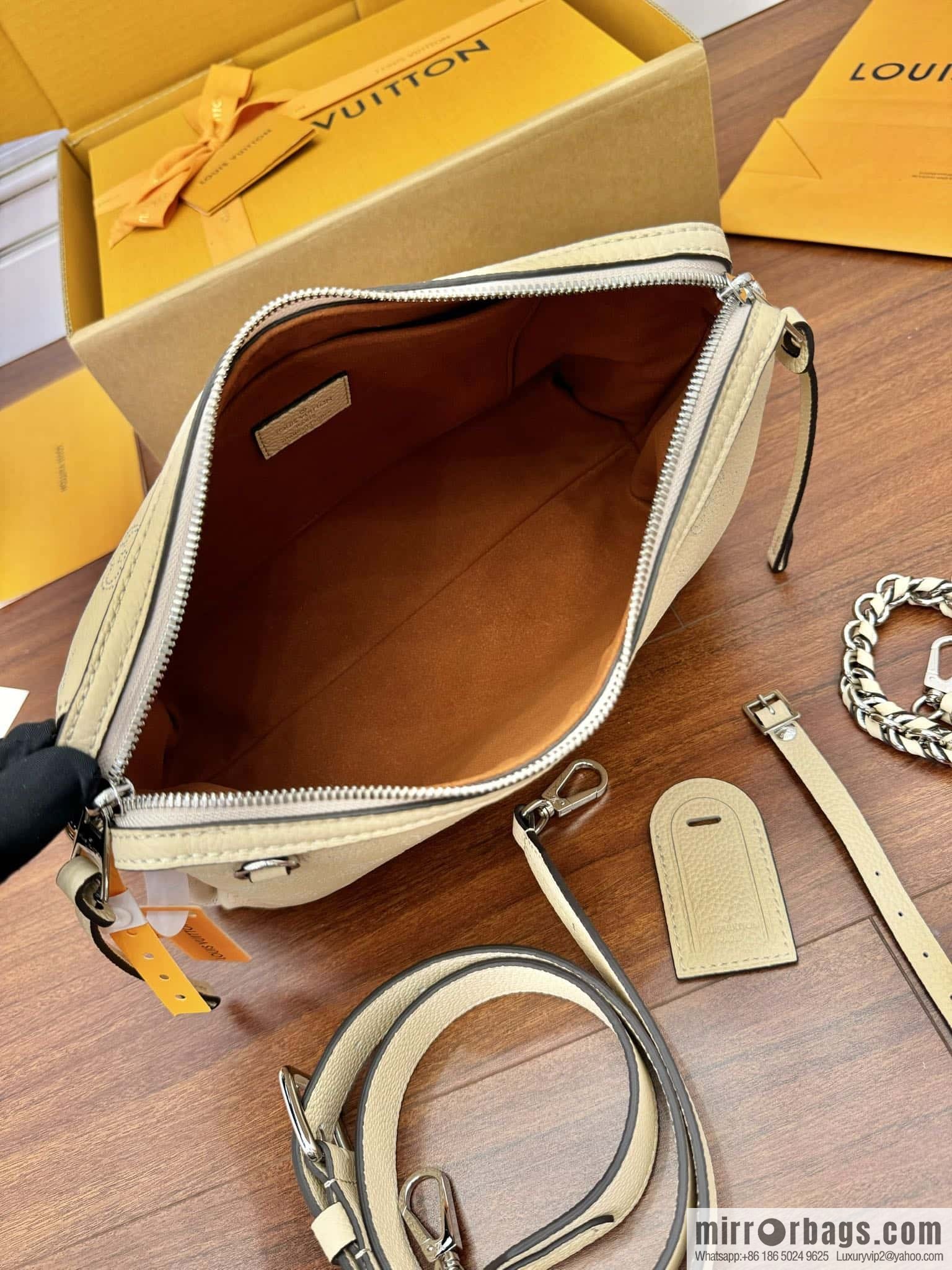 LV M24114 HAND IT ALL Small handbag
