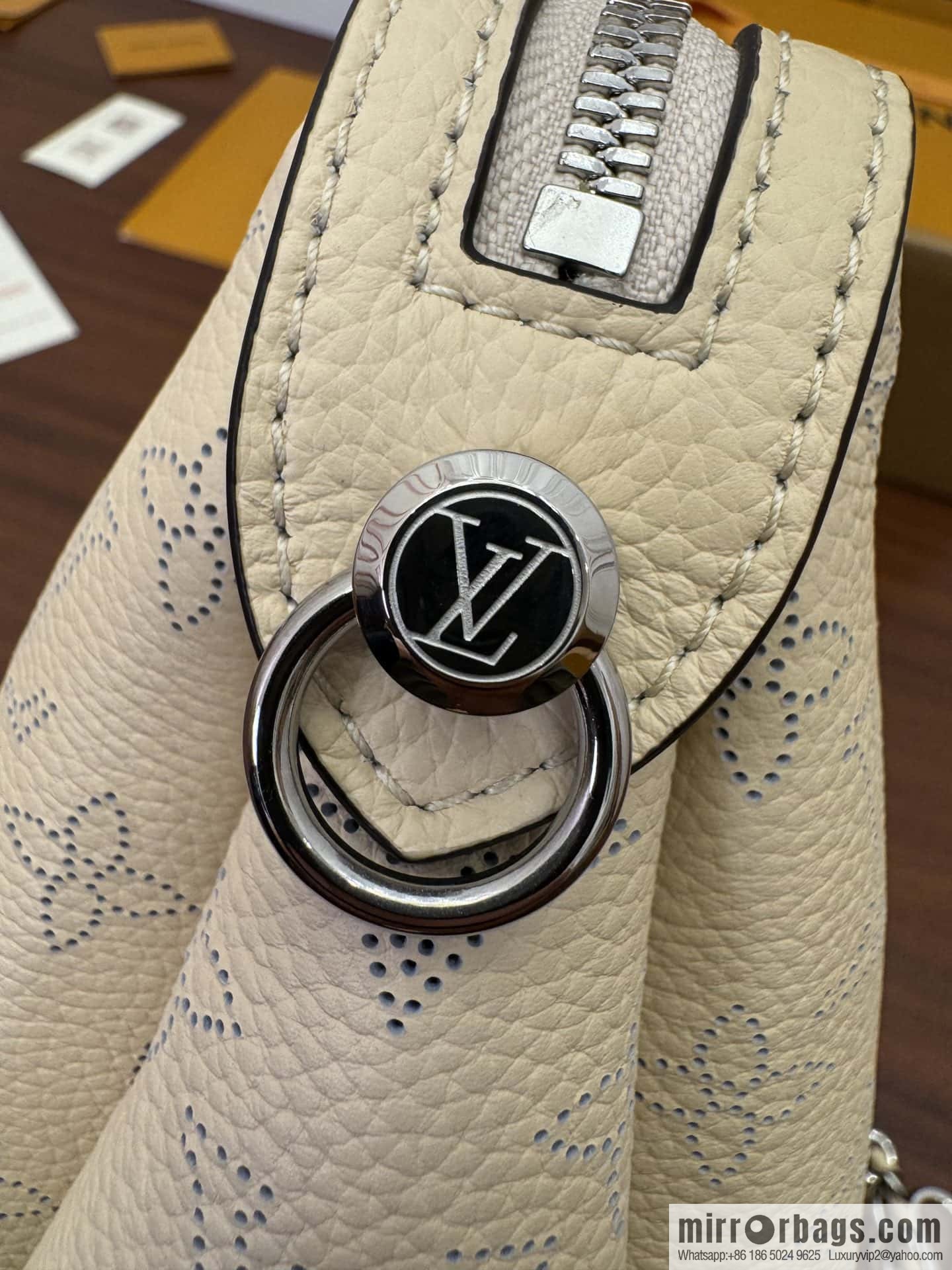 LV M24114 HAND IT ALL Small handbag