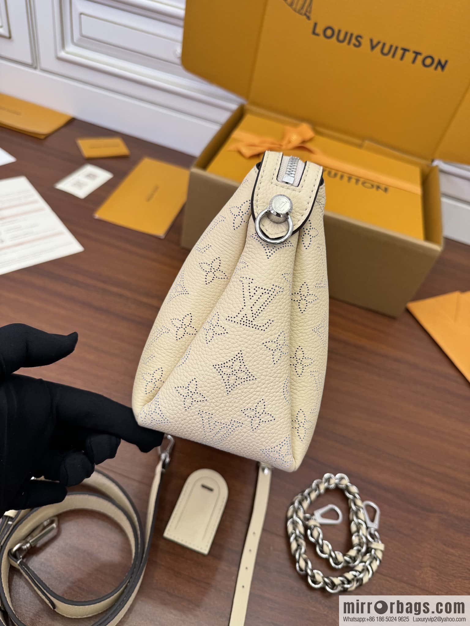 LV M24114 HAND IT ALL Small handbag