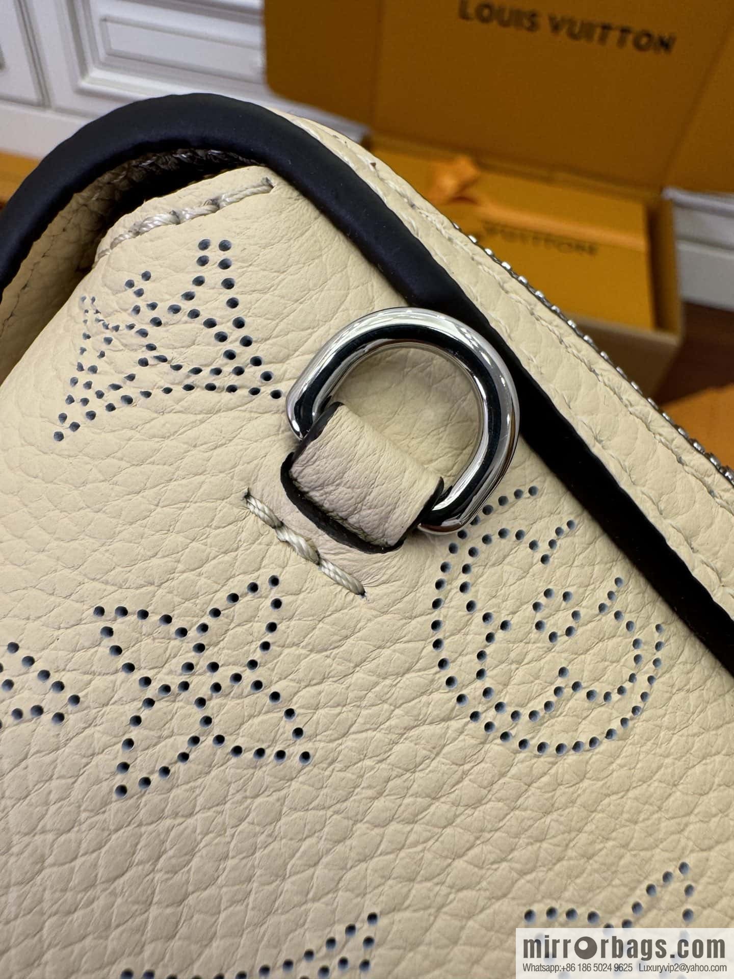 LV M24114 HAND IT ALL Small handbag