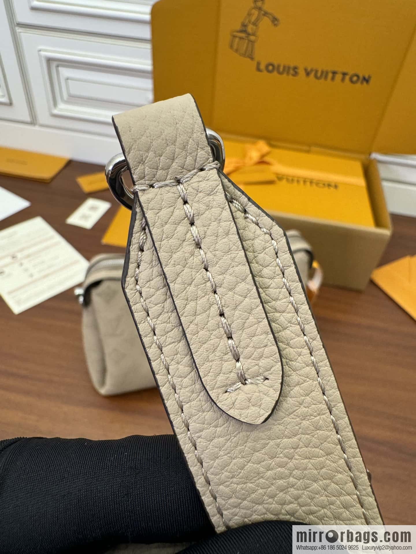 LV M24114 HAND IT ALL Small handbag