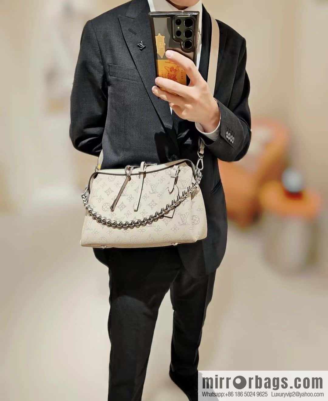 LV M24255 HAND IT ALL Small handbag