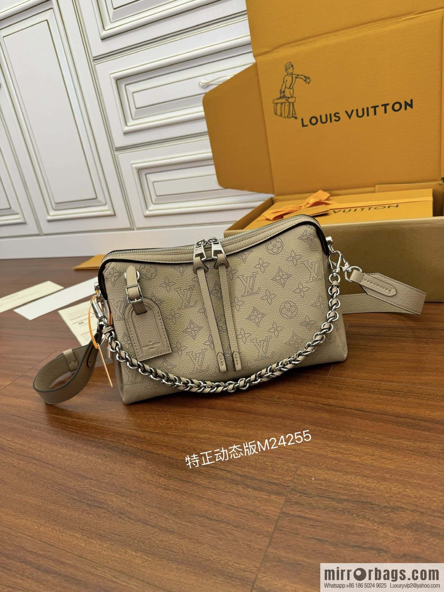 LV M24255 HAND IT ALL Small handbag