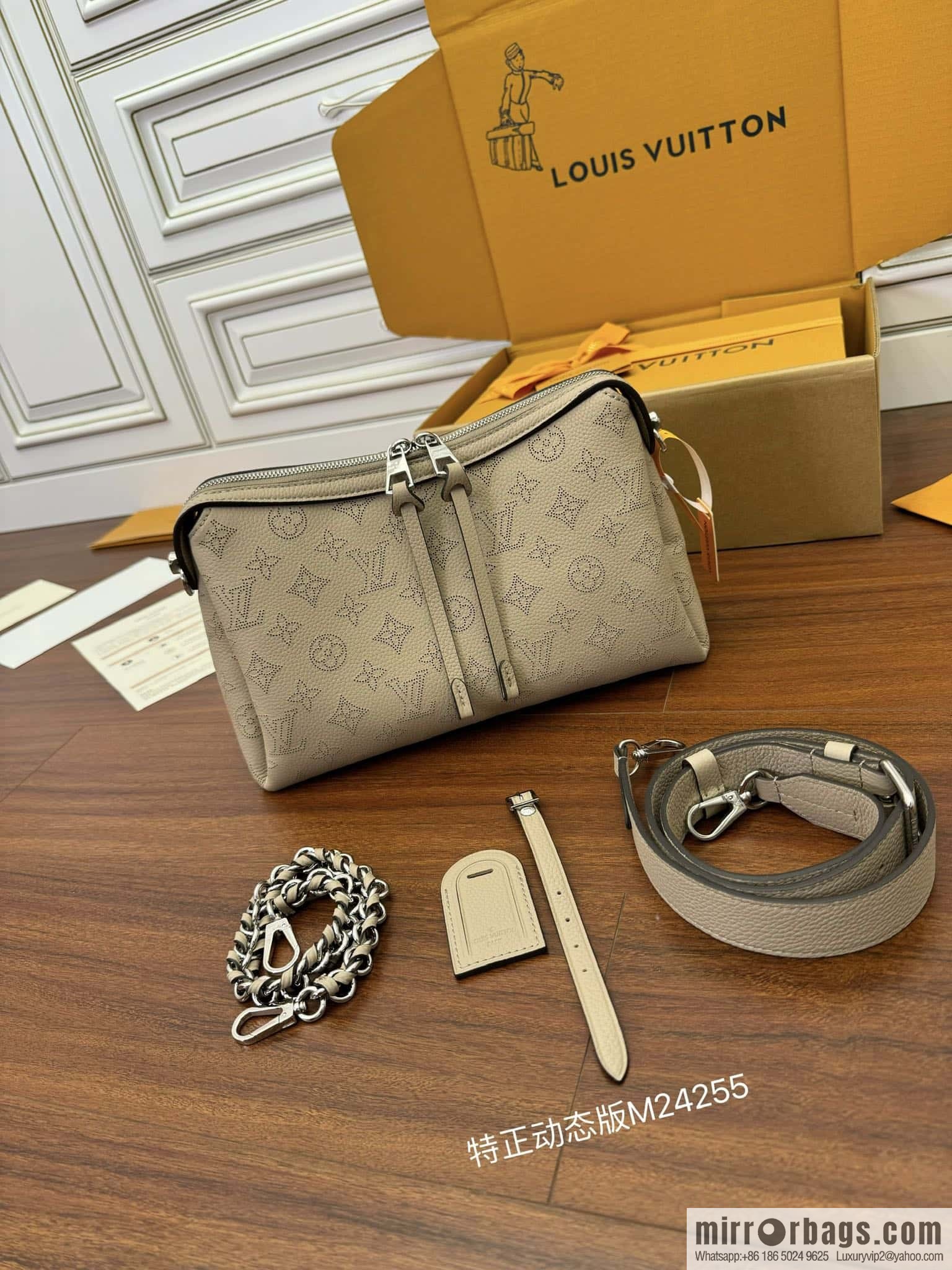 LV M24255 HAND IT ALL Small handbag