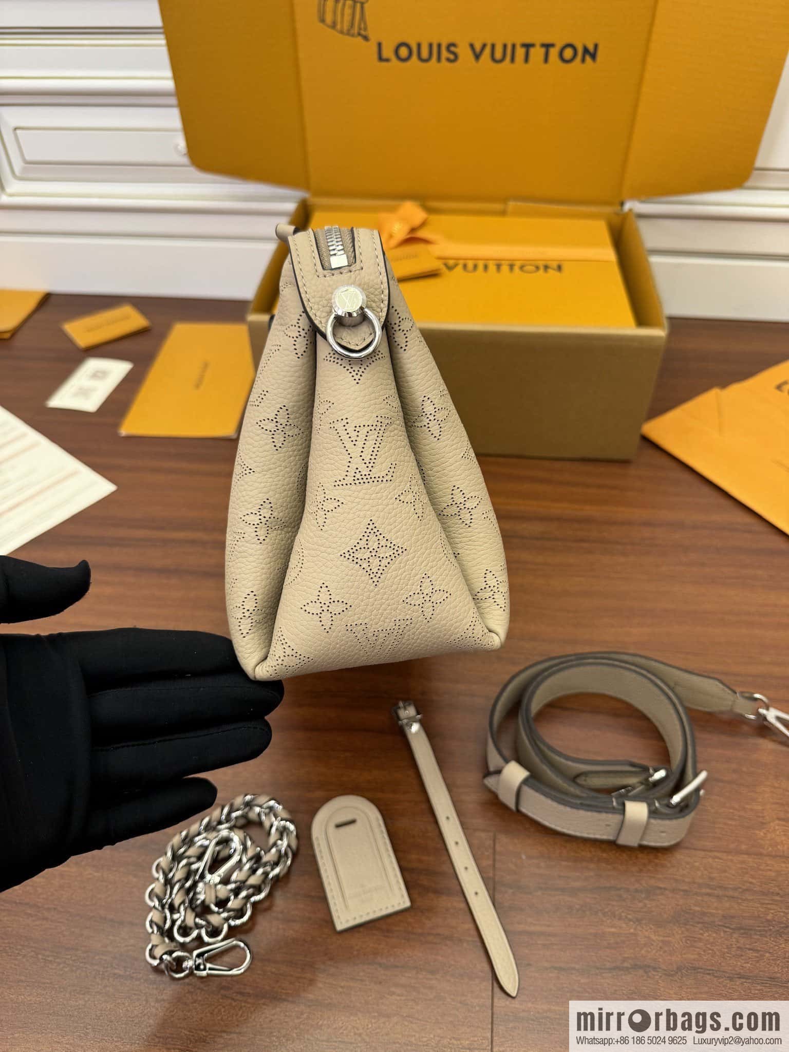 LV M24255 HAND IT ALL Small handbag
