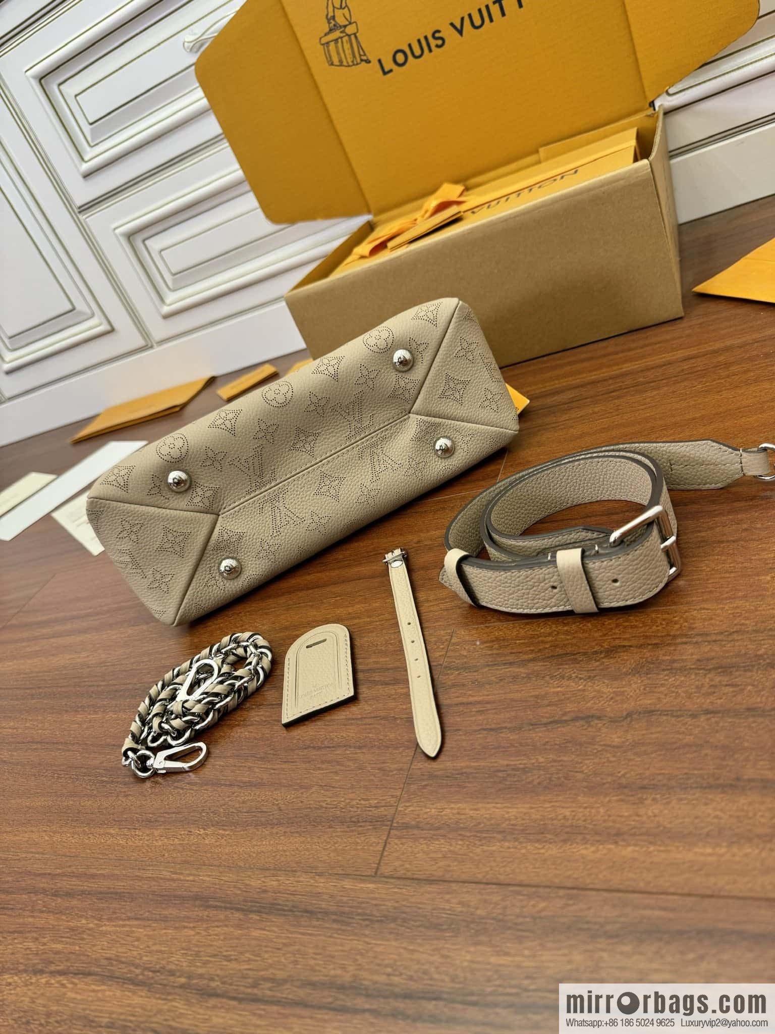 LV M24255 HAND IT ALL Small handbag