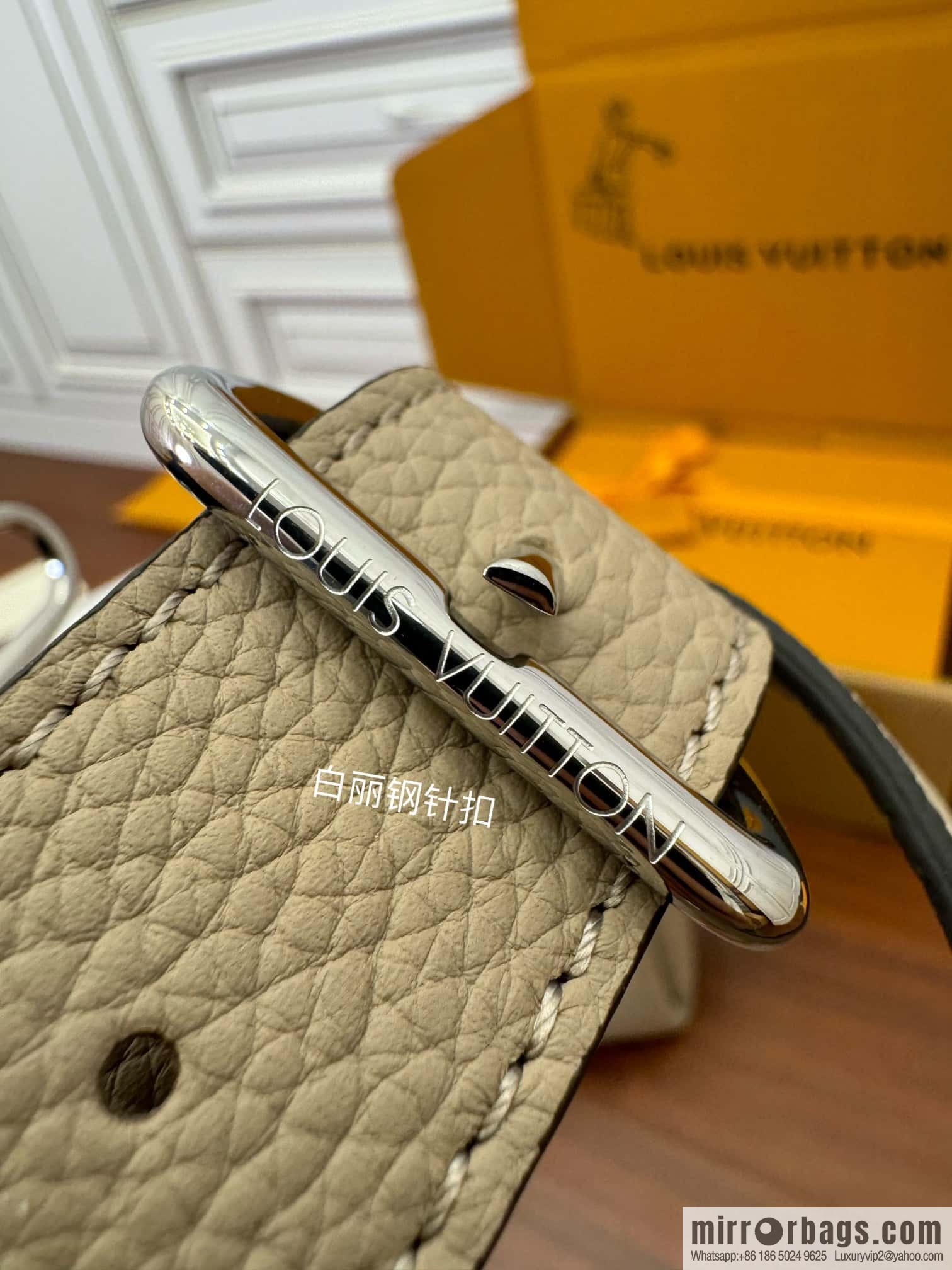 LV M24255 HAND IT ALL Small handbag