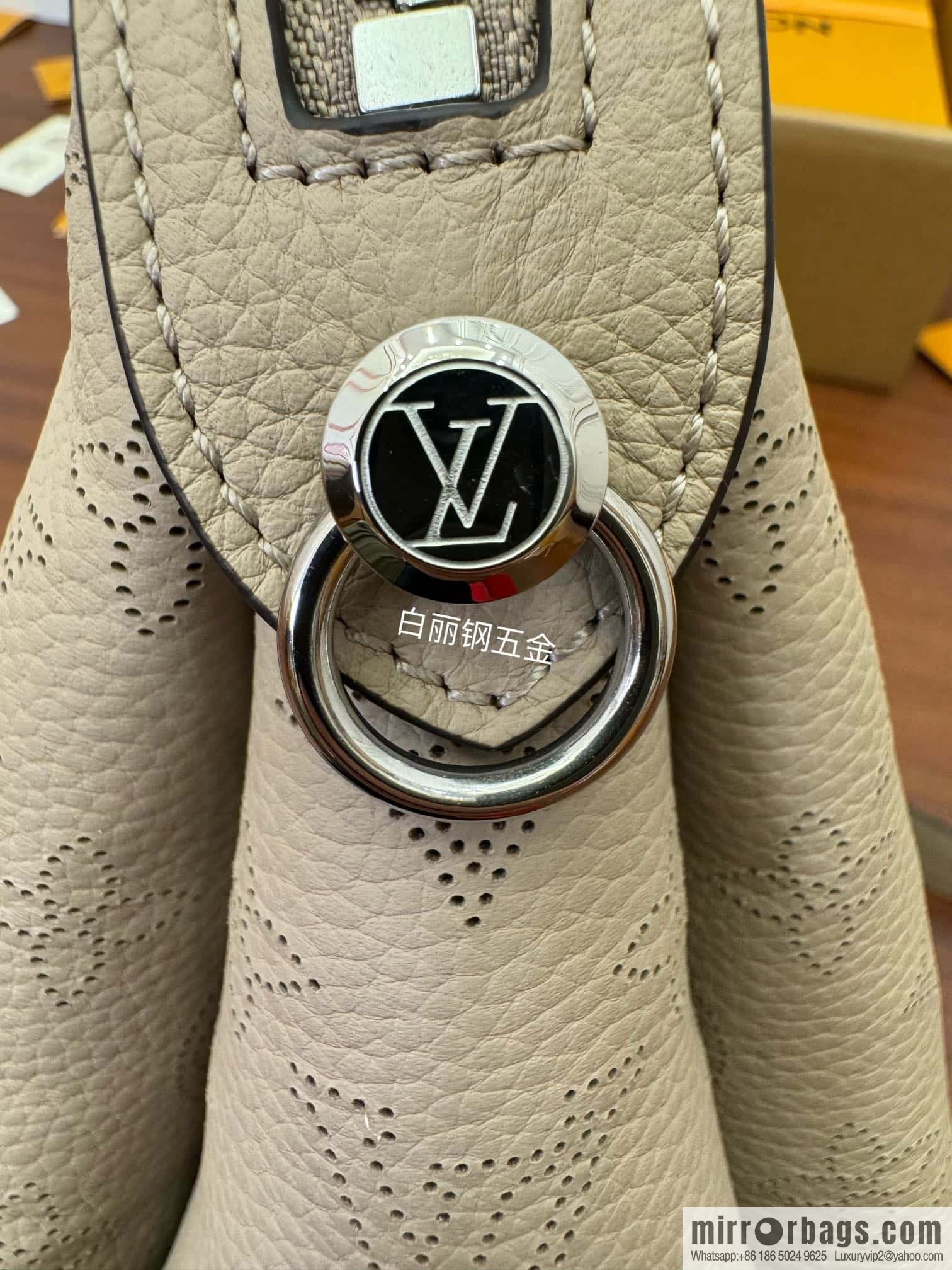 LV M24255 HAND IT ALL Small handbag