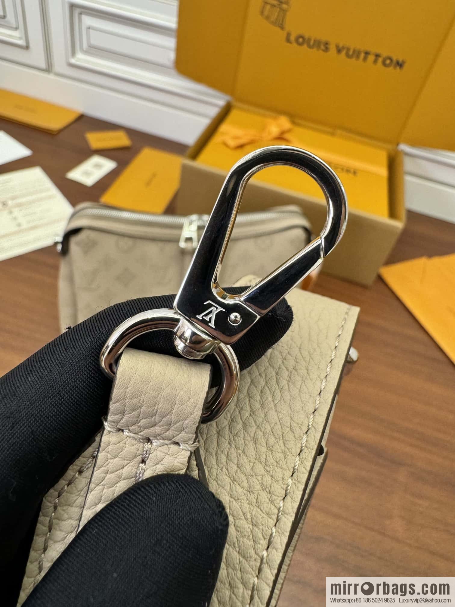 LV M24255 HAND IT ALL Small handbag